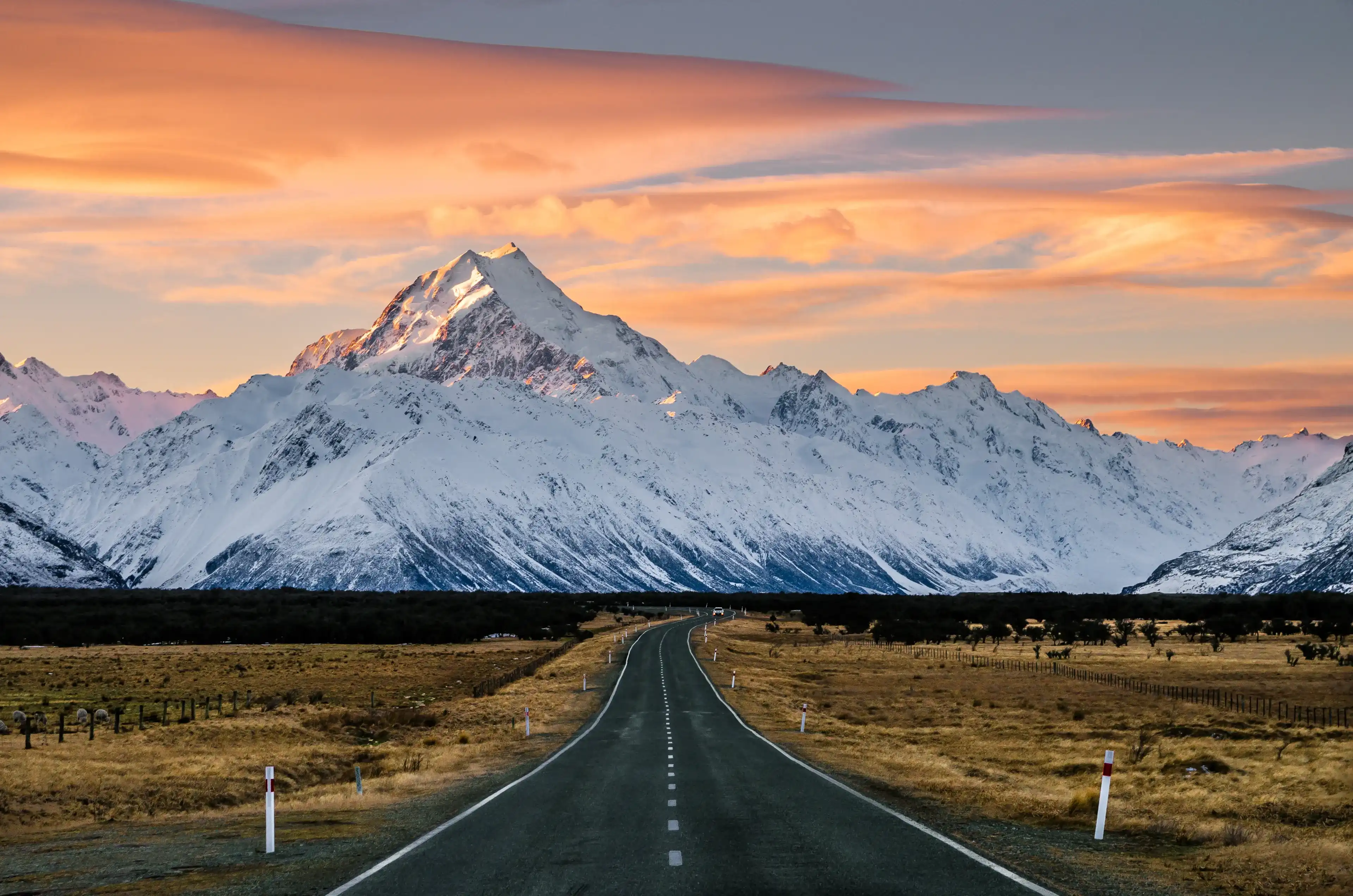View of the majestic Aoraki Mount Cook with the road leading to Mount Cook Village. Taken during winter in New Zealand. View of the majestic Aoraki Mount Cook with the road leading to Mount Cook Village. Taken during winter in New Zealand.