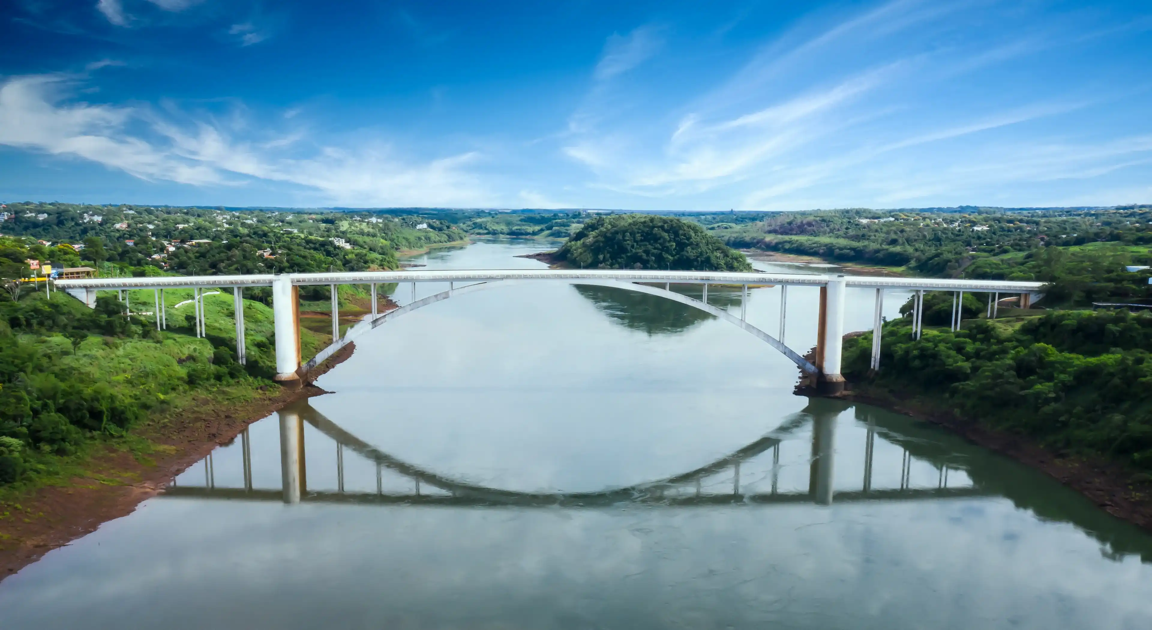 Ciudad del Este, Paraguay - January 17, 2020: Aerial view of Ciudad del Este, the second largest city in Paraguay, on the border with Foz do Iguacu, Brazil. Ciudad del Este, Paraguay - January 17, 2020: Aerial view of Ciudad del Este, the second largest city in Paraguay, on the border with Foz do Iguacu, Brazil.