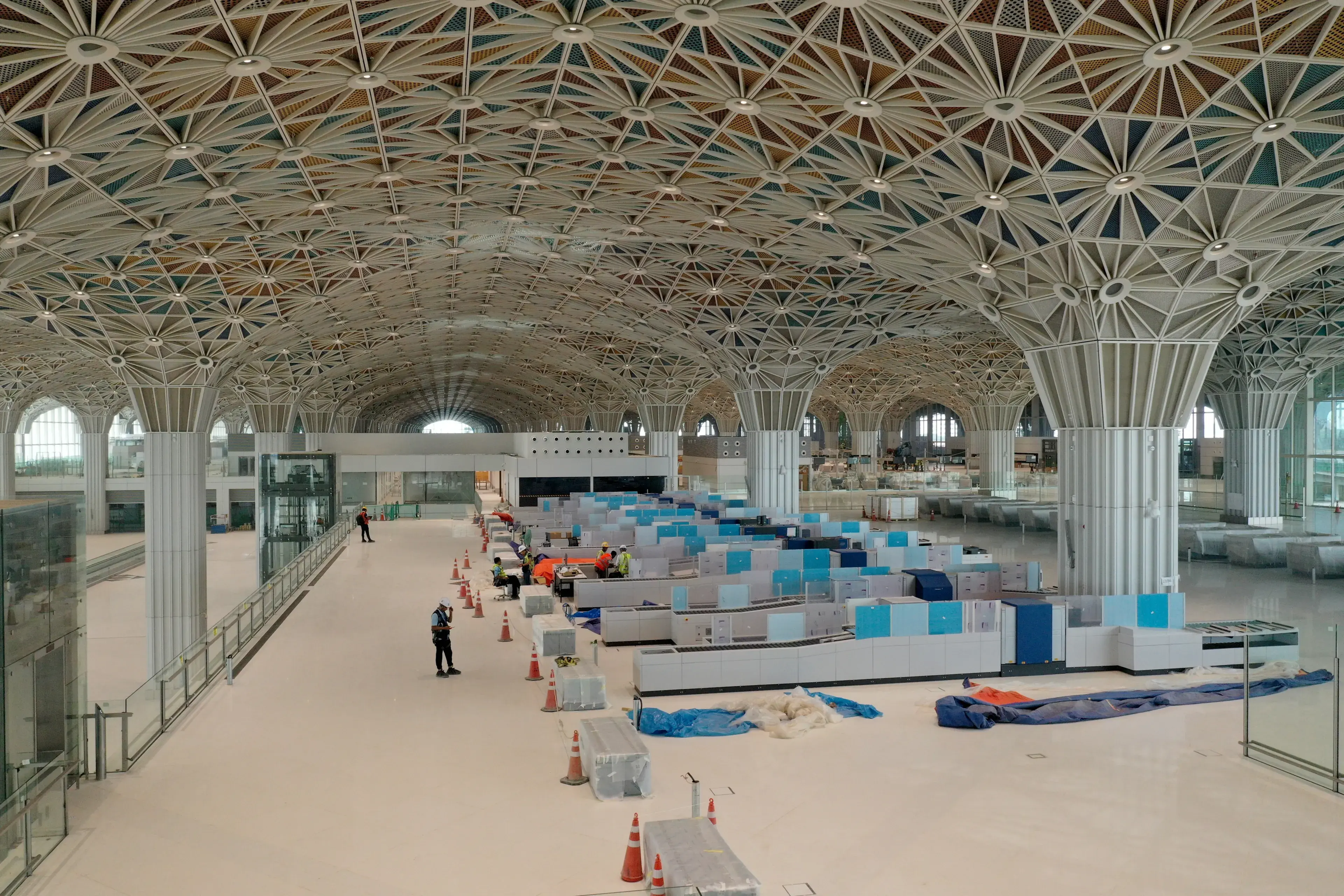 Dhaka, Bangladesh - September 26, 2023: Work on the third terminal of Hazrat Shahjalal International Airport at Dhaka in Bangladesh nears completion. Dhaka, Bangladesh - September 26, 2023: Work on the third terminal of Hazrat Shahjalal International Airport at Dhaka in Bangladesh nears completion.