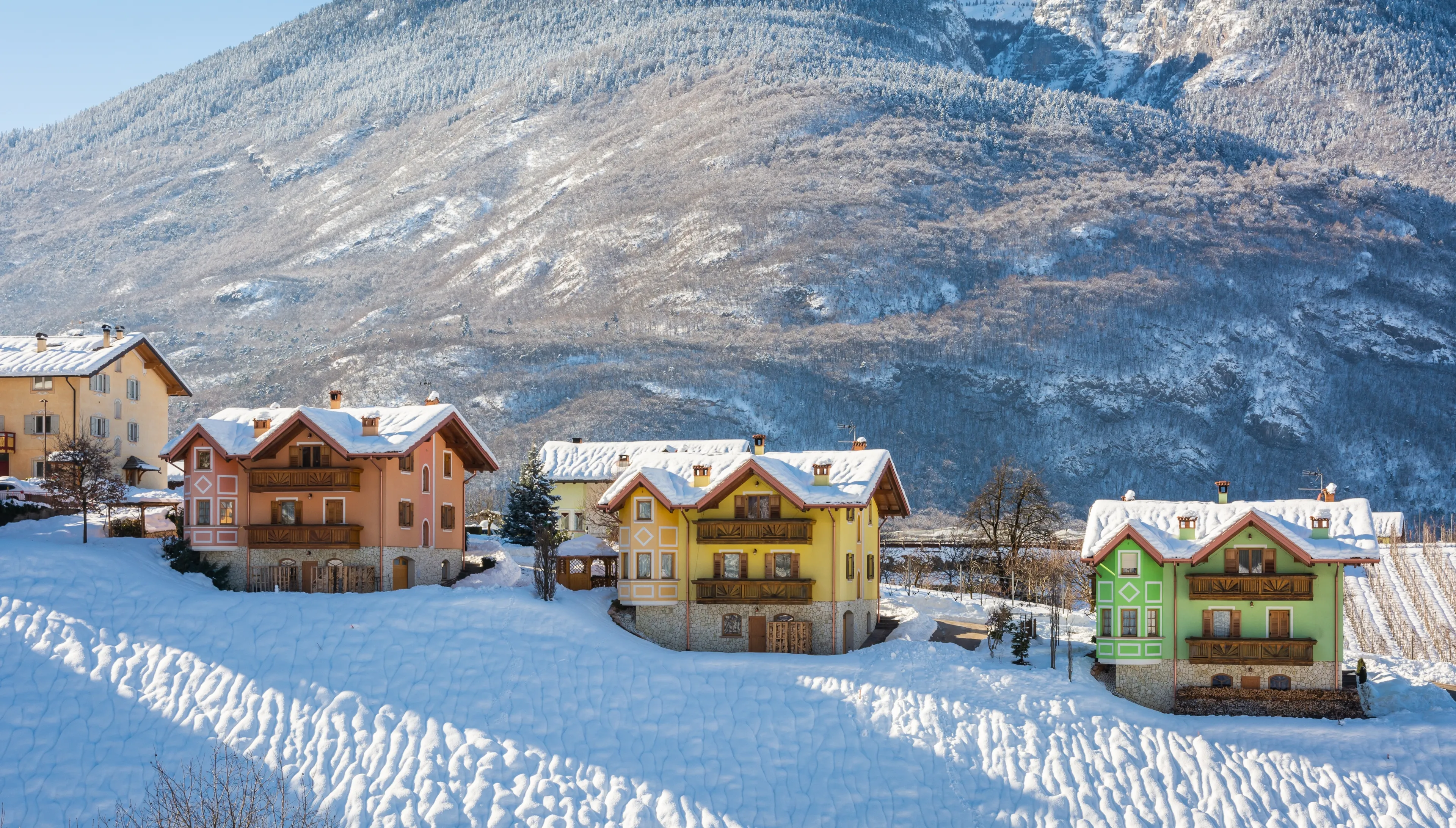 Beautiful winter mountain snow-covered landscape on sunny day. Andalo village, Adamello Brenta Natural Park, Trentino Alto Adige, northern Italy, Europe