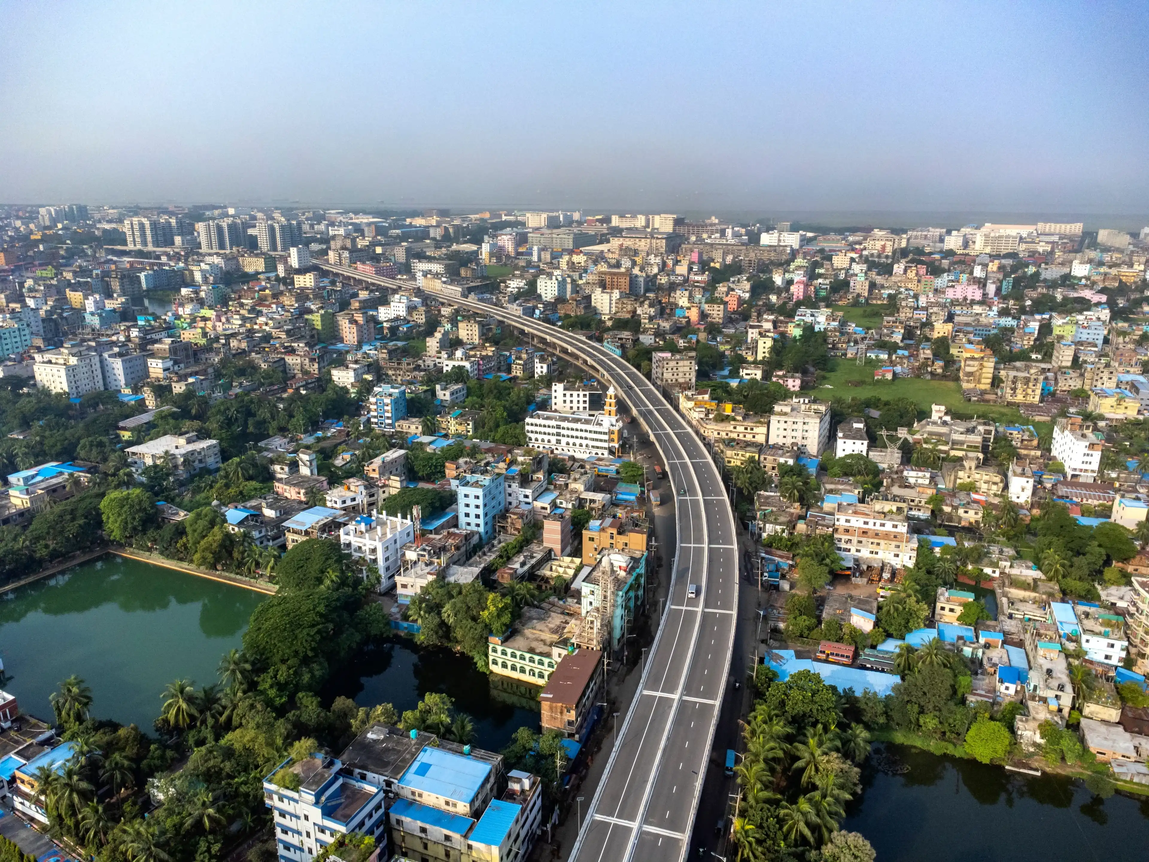 Elevated Expressway from Lalkhan Bazar to Sha-Amanat Airport in Chittagong, Bangladesh. Chattogram's first elevated expressway with Chittagong City aerial view. Aerial View Cityscape of Chittagong Elevated Expressway from Lalkhan Bazar to Sha-Amanat Airport in Chittagong, Bangladesh. Chattogram's first elevated expressway with Chittagong City aerial view. Aerial View Cityscape of Chittagong
