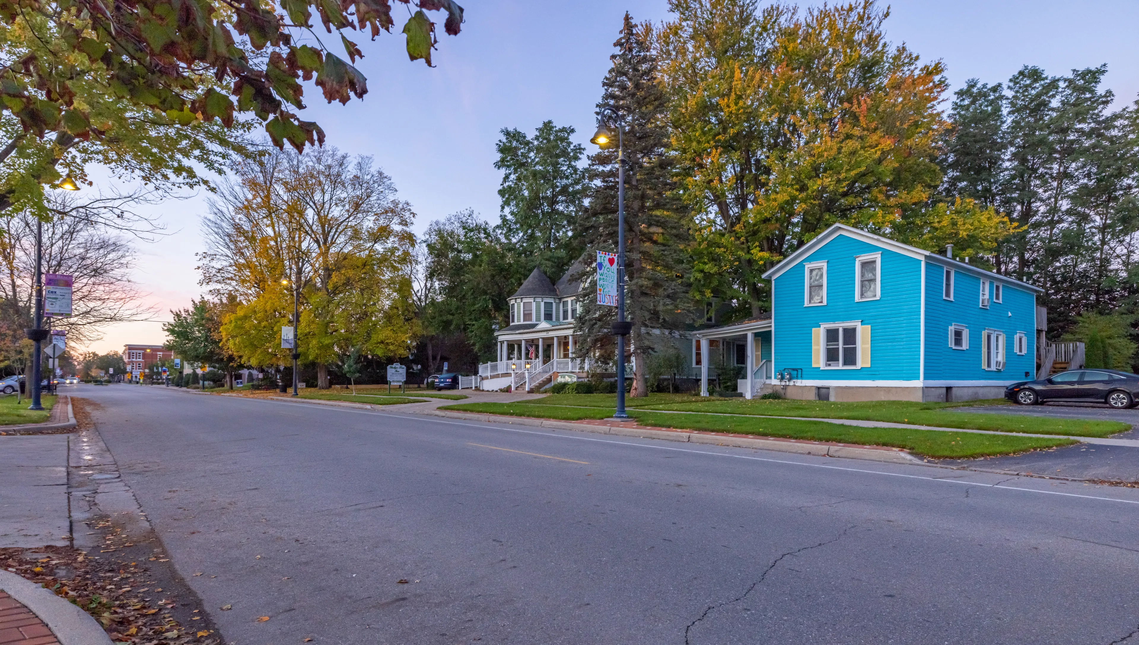 Mount Pleasant, Michigan, USA - October 22, 2021: Residential area with antique House along Main Street