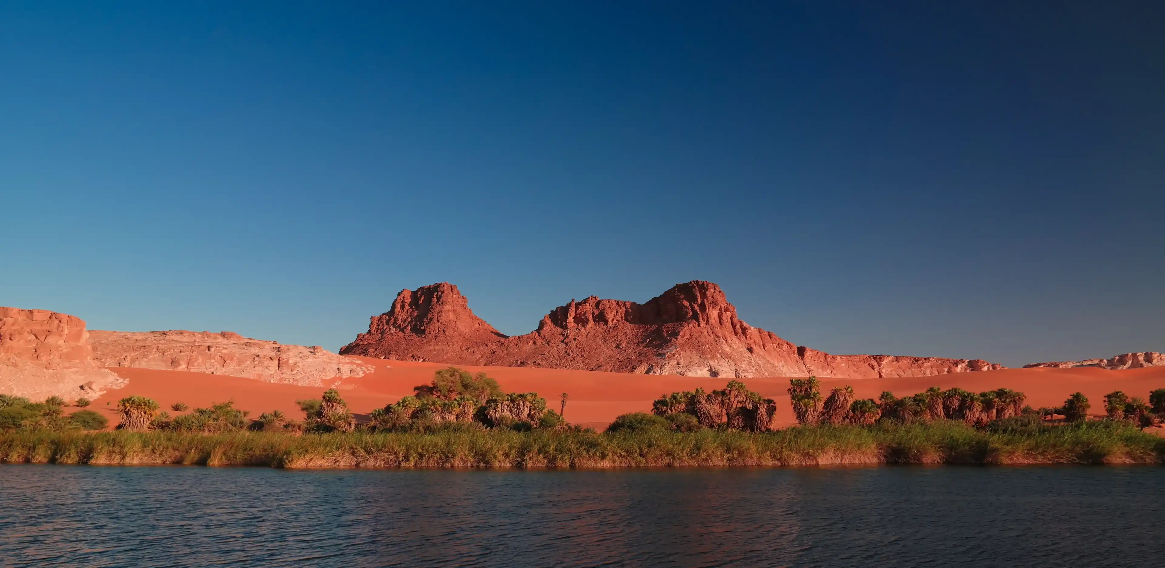 Panoramic view to Boukkou lake group of Ounianga Serir lakes at sunset , Ennedi, Chad Panoramic view to Boukkou lake group of Ounianga Serir lakes at sunset , Ennedi, Chad