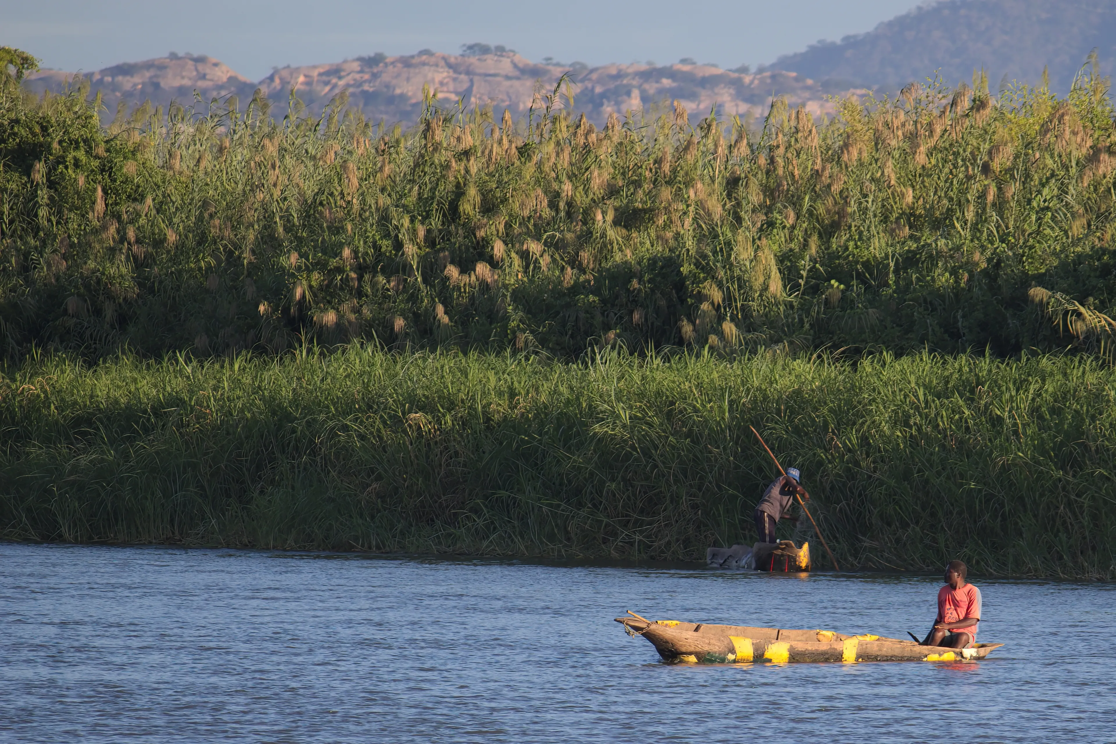 Tete, Mozambique, May 17 2022. Two dugout canoes on the Zambezi River