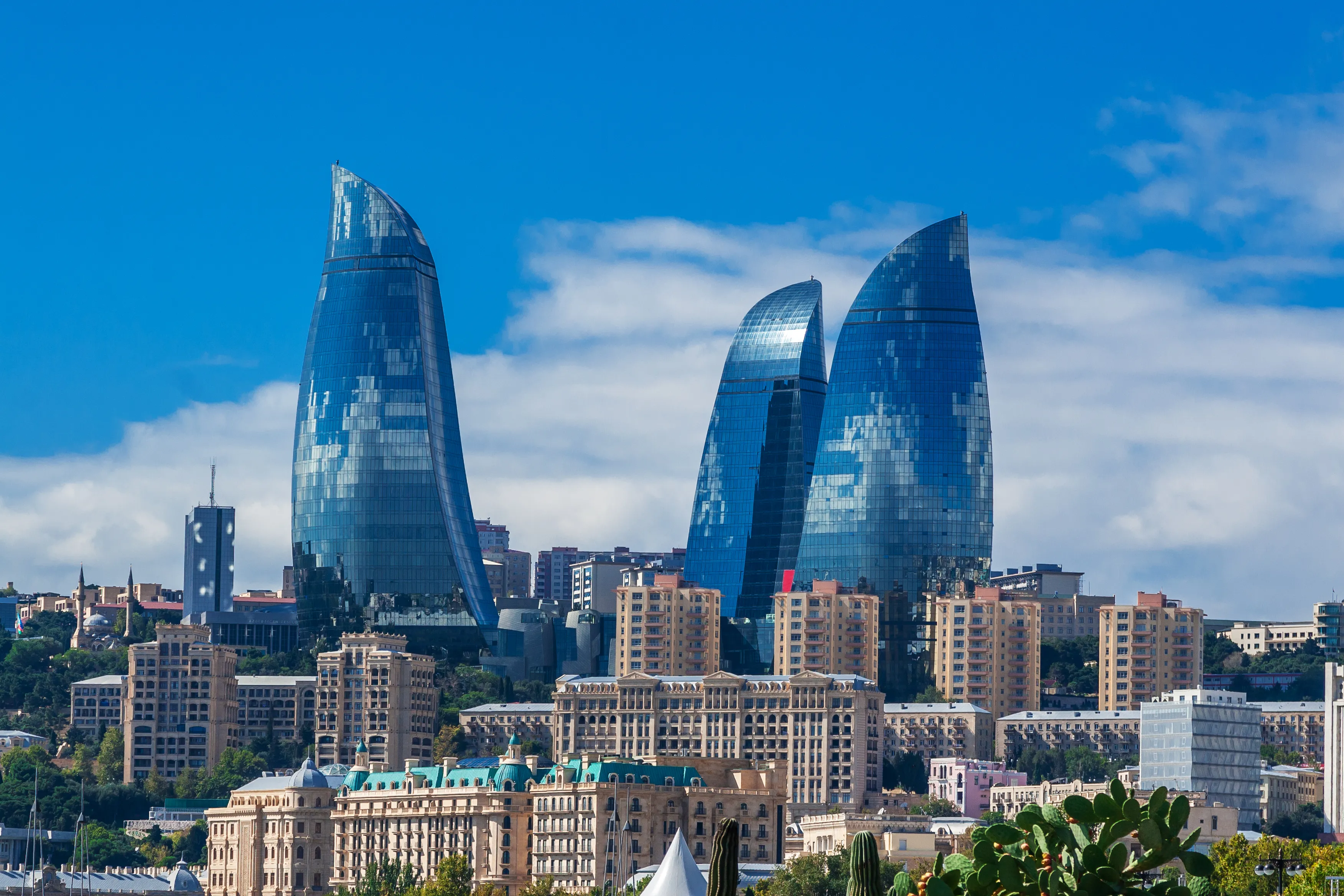 Baku, Azerbaijan - October 2, 2016: Flame towers in the cityscape. Panoramic view of Baku - the capital of Azerbaijan located by the Caspian See shore.