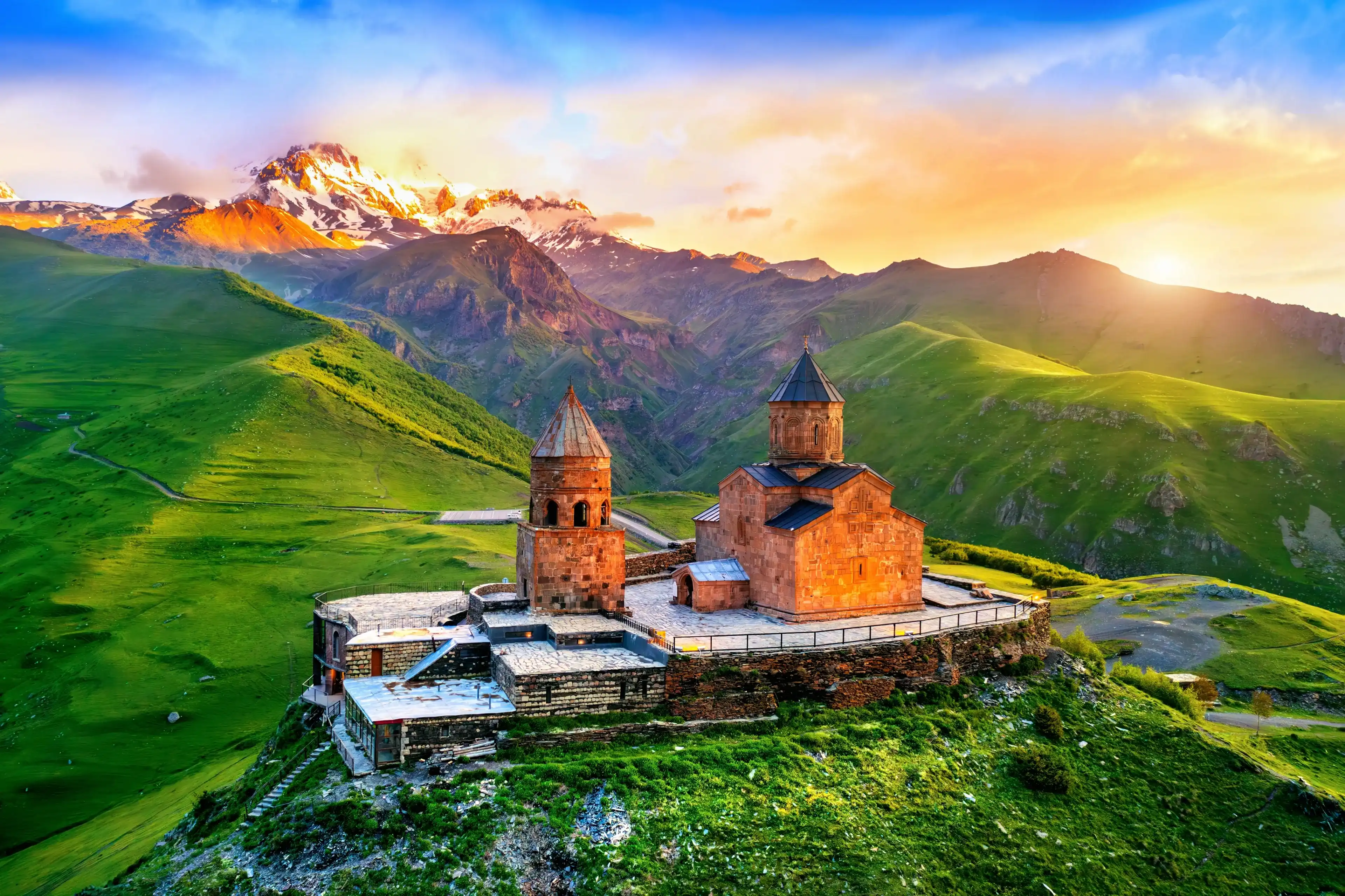 Aerial view of Gergeti trinity church at sunrise in Georgia. Aerial view of Gergeti trinity church at sunrise in Georgia.