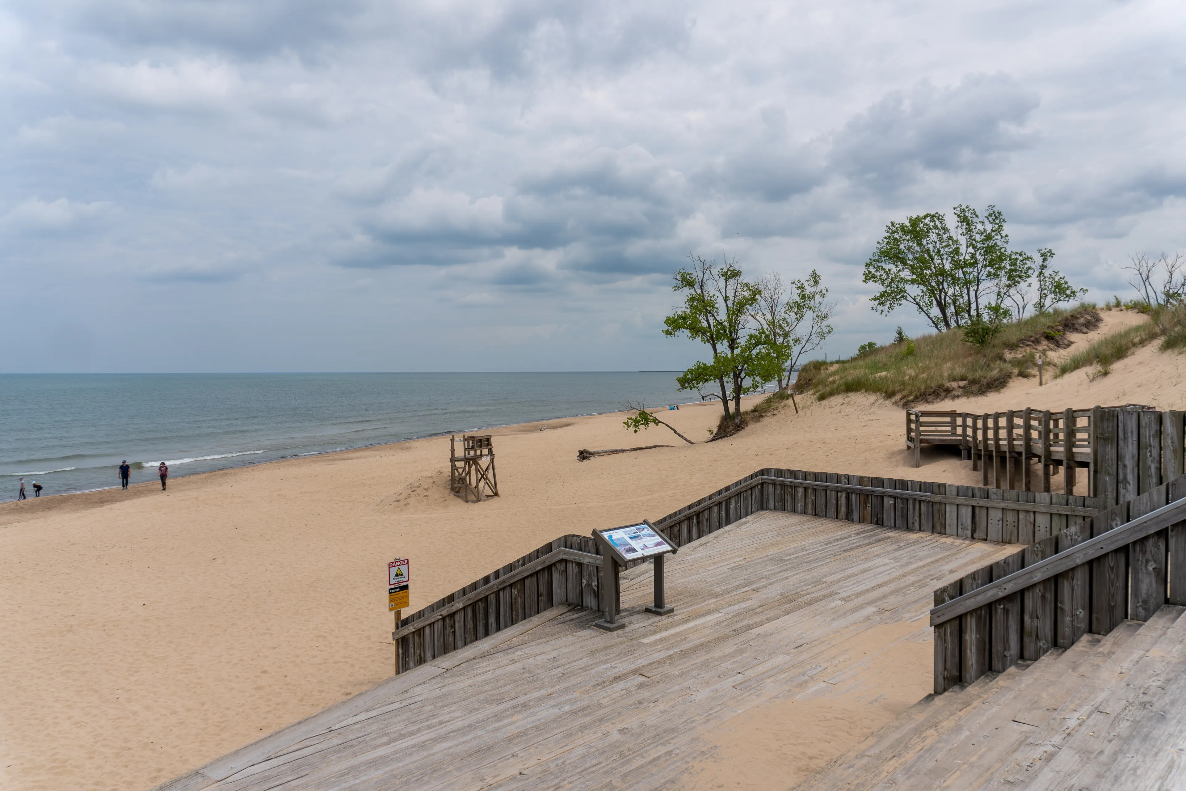 Portage, Indiana -Jul 13, 2024: Indiana Dunes National Park along the southern shore of Lake Michigan. West Beach area, a popular beach portion of the park. Bathhouse deck and boardwalk. 