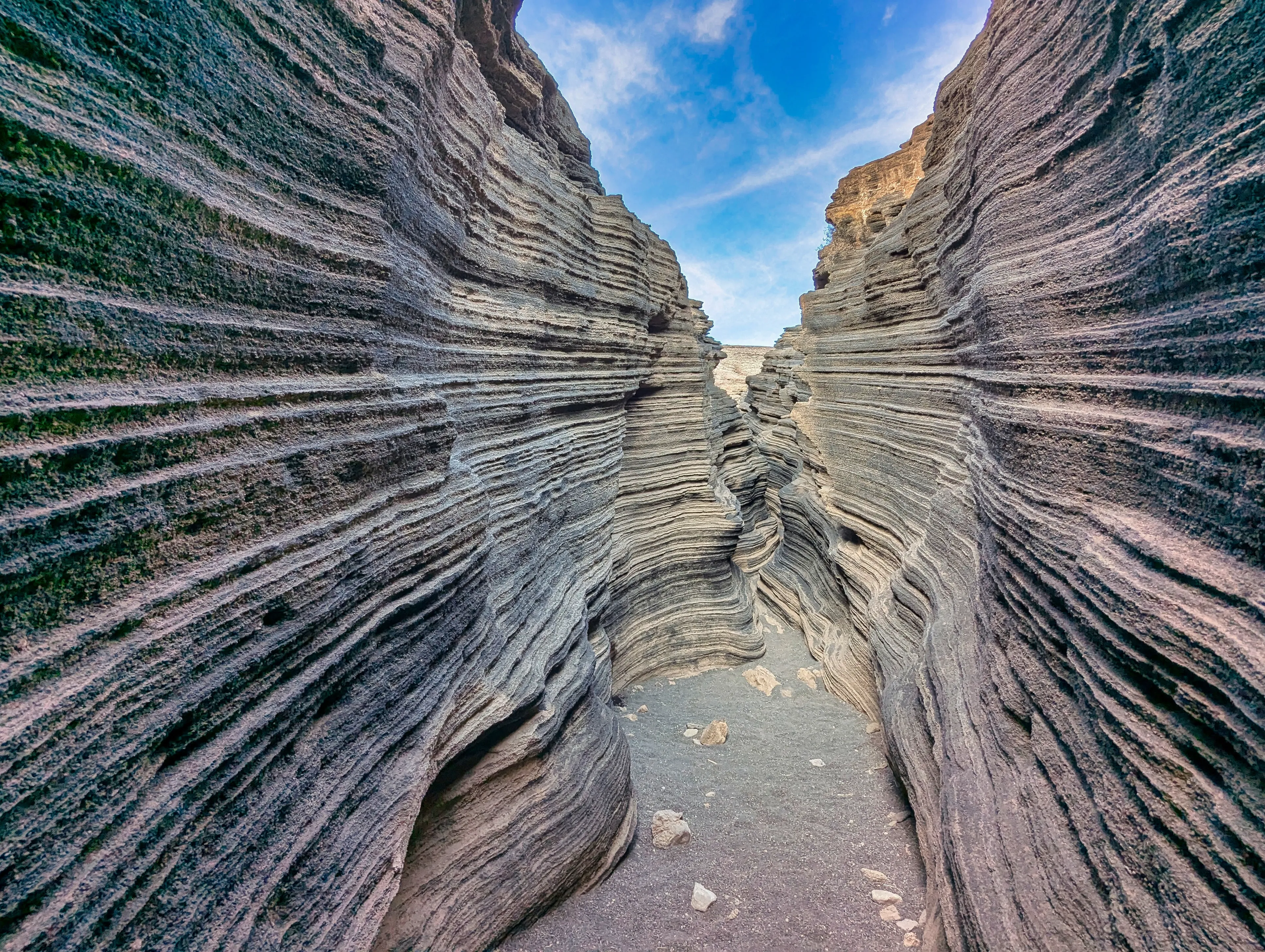 The broad volcanic gorge. The Cracks ( Las Grietas ). The slope of the Montana Blanca volcano. Lanzarote, Canary Islands, Spain