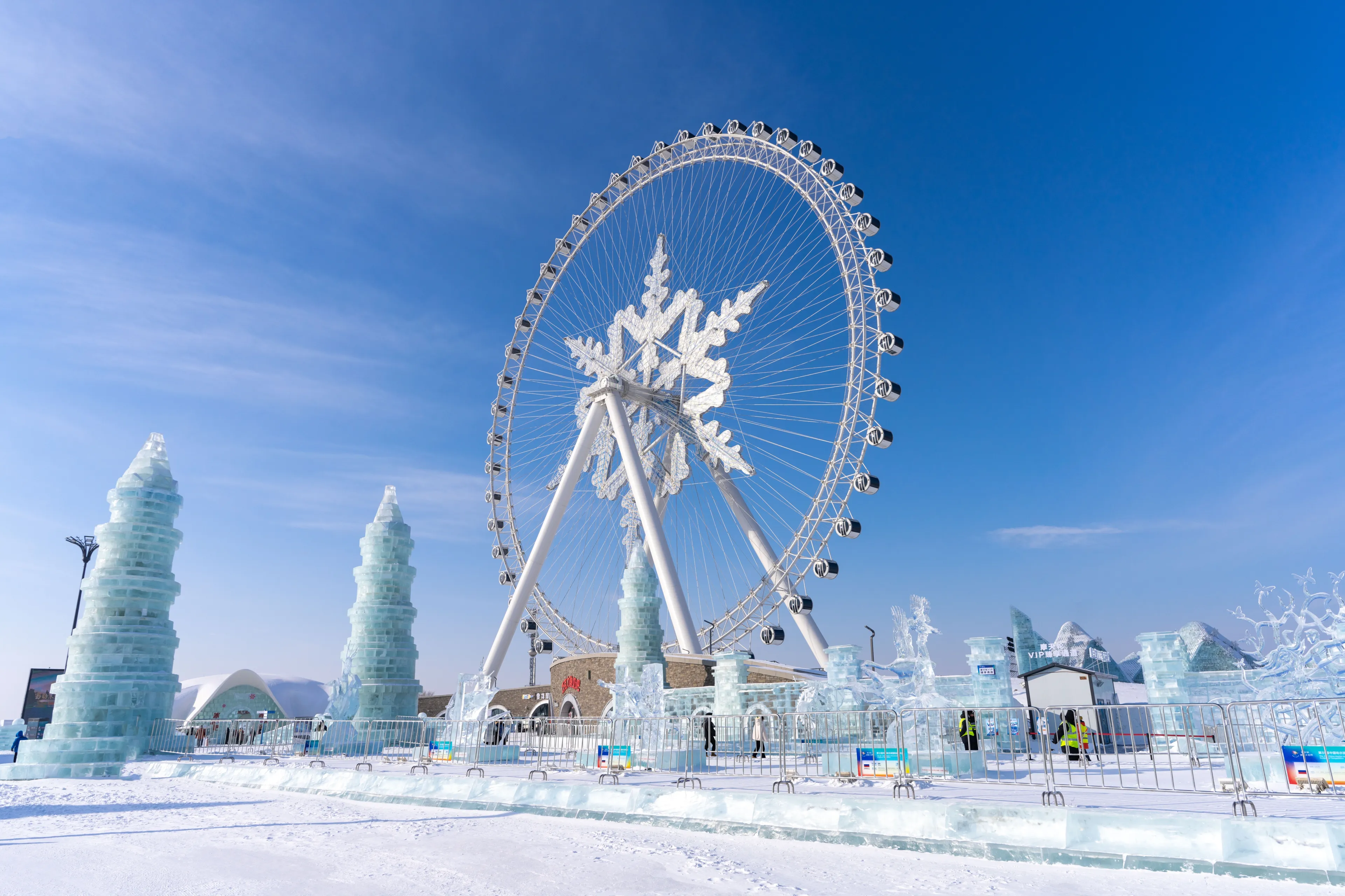 HARBIN, CHINA - JAN 08, 2023: Harbin International Ice and Snow Sculpture Festival is an annual winter festival that takes place in Harbin, China. It is the world largest ice and snow festival.