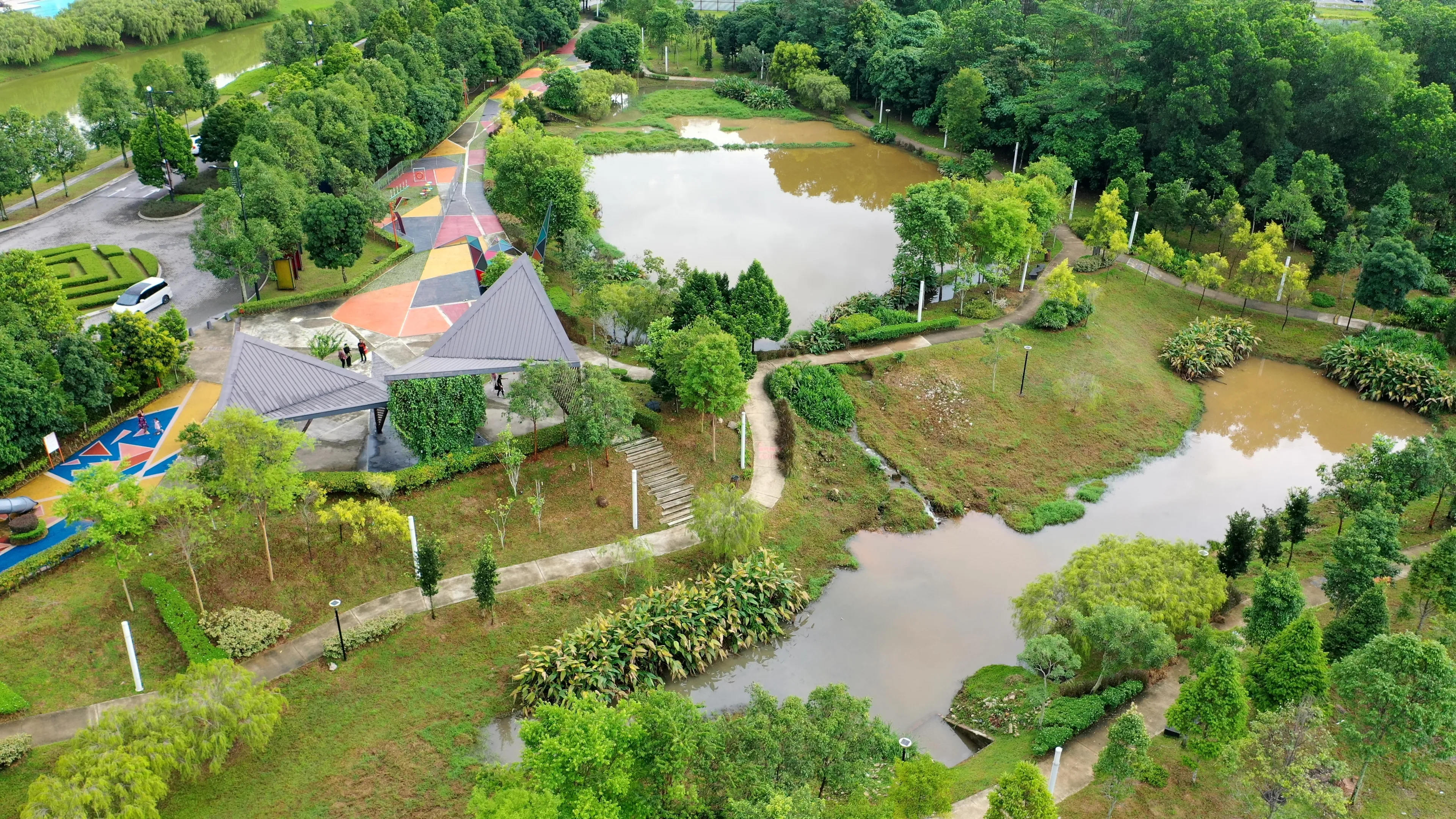 Kajang, Malaysia - May 1 2023: An aerial photography of jogging park with small lakes near Kajang residential