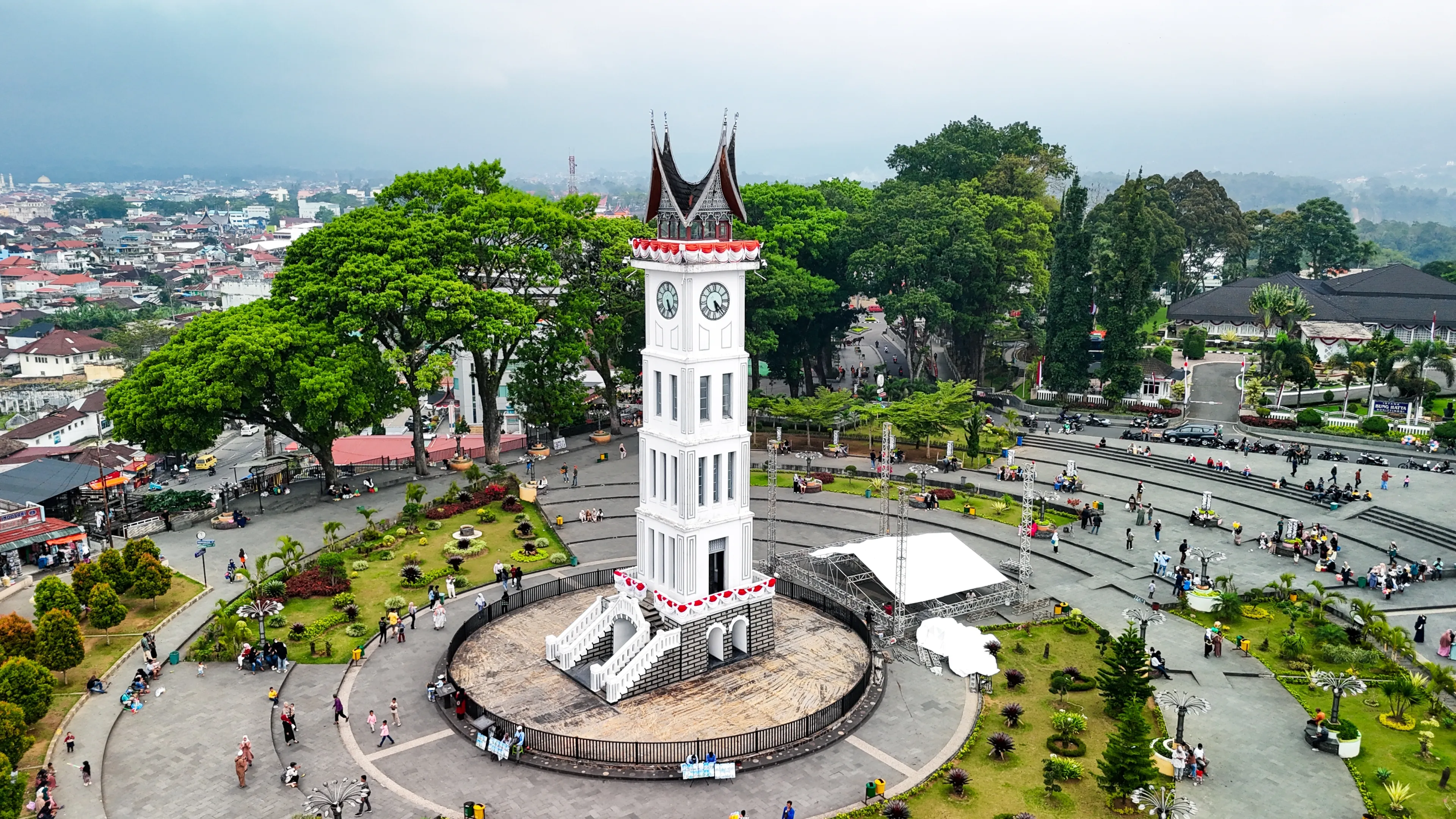 Jam Gadang in Bukit Tinggi, West Sumatera. Landmark, city square, park, Minangkabau, Dutch buildings, colonial architecture, traditional building, clock tower. Bukittinggi, Indonesia - 08.22.2024.