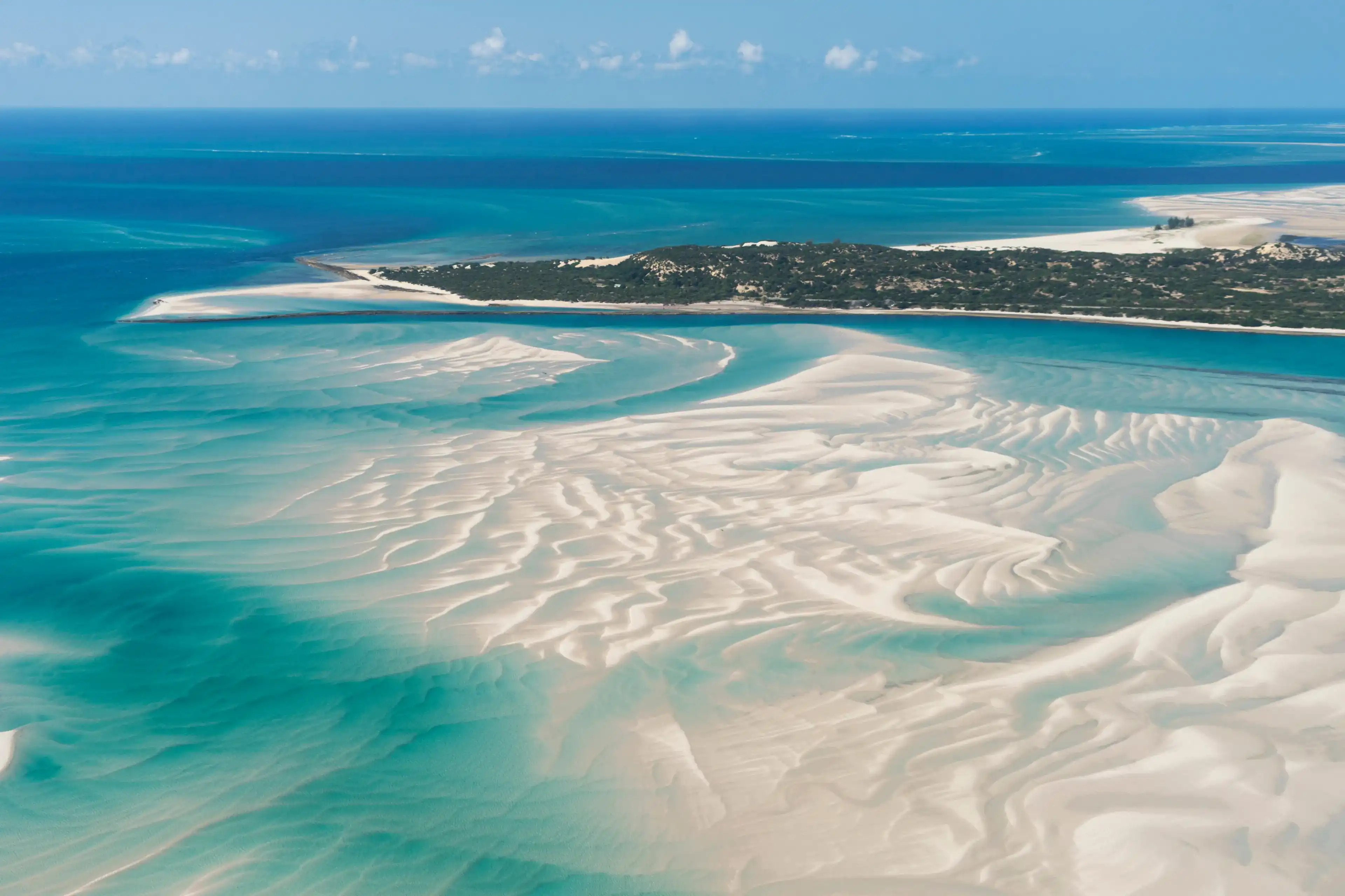 An Island in Vilankulo, Mozambique, Africa As Seen From Above, Surrounded by Sand and Water An Island in Vilankulo, Mozambique, Africa As Seen From Above, Surrounded by Sand and Water
