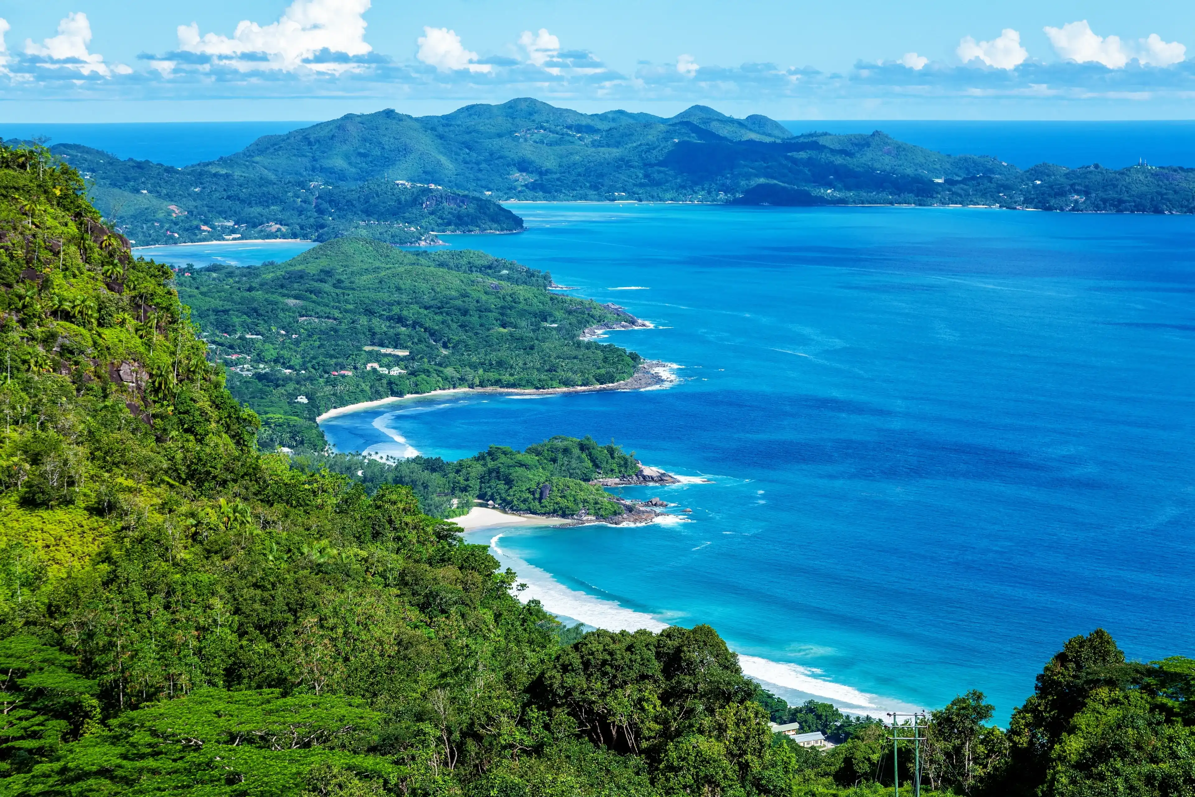West coast of the Island Mahé, Republic of Seychelles, Africa. Bay Grand Anse in the foreground, Bay Anse Boileau and Bay Anse a la Mouche in the background. View from Venn's Town - Mission Lodge. West coast of the Island Mahé, Republic of Seychelles, Africa. Bay Grand Anse in the foreground, Bay Anse Boileau and Bay Anse a la Mouche in the background. View from Venn's Town - Mission Lodge.