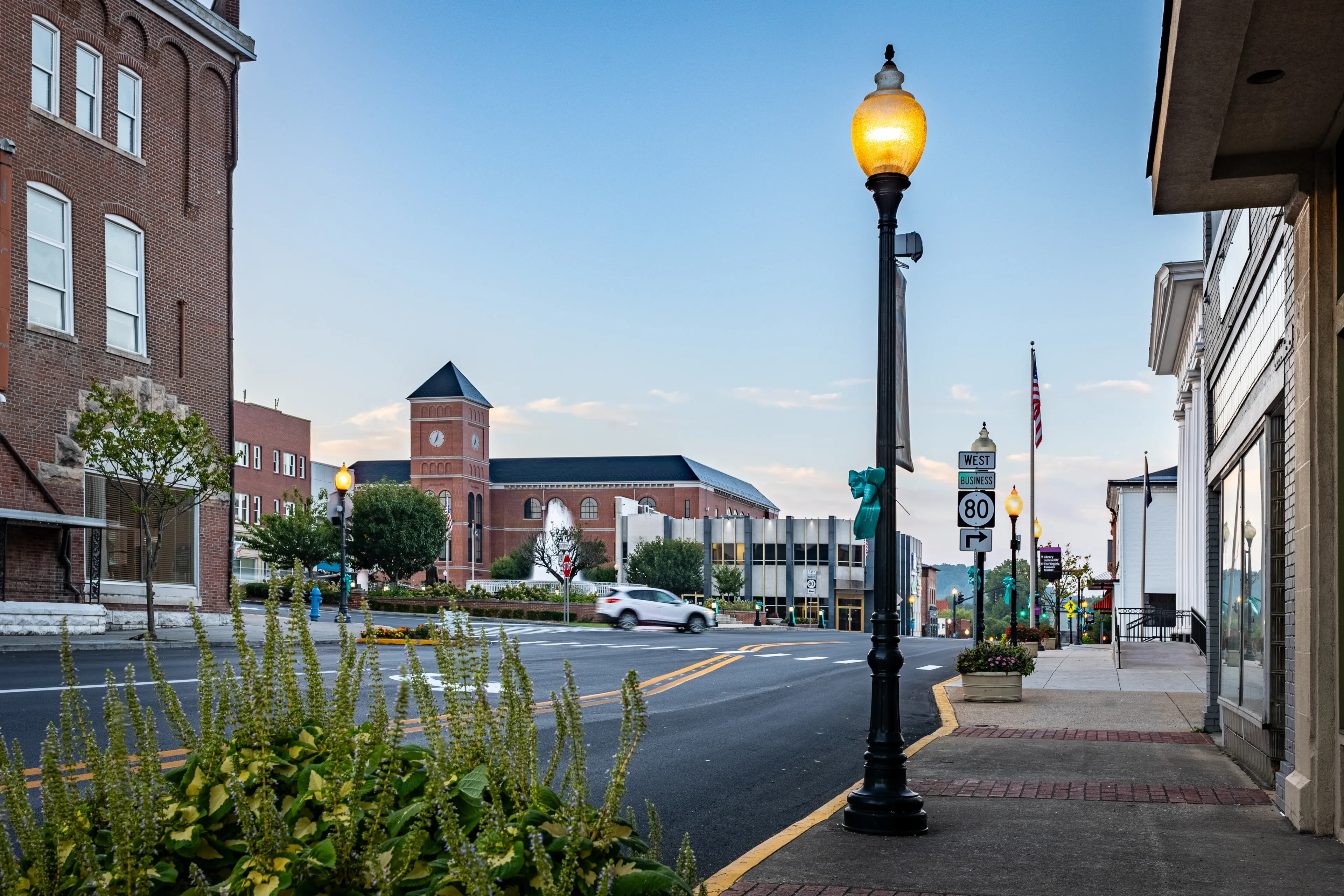 A car is turning on the roundabout around downtown fountain in a square in Somerset, Kentucky