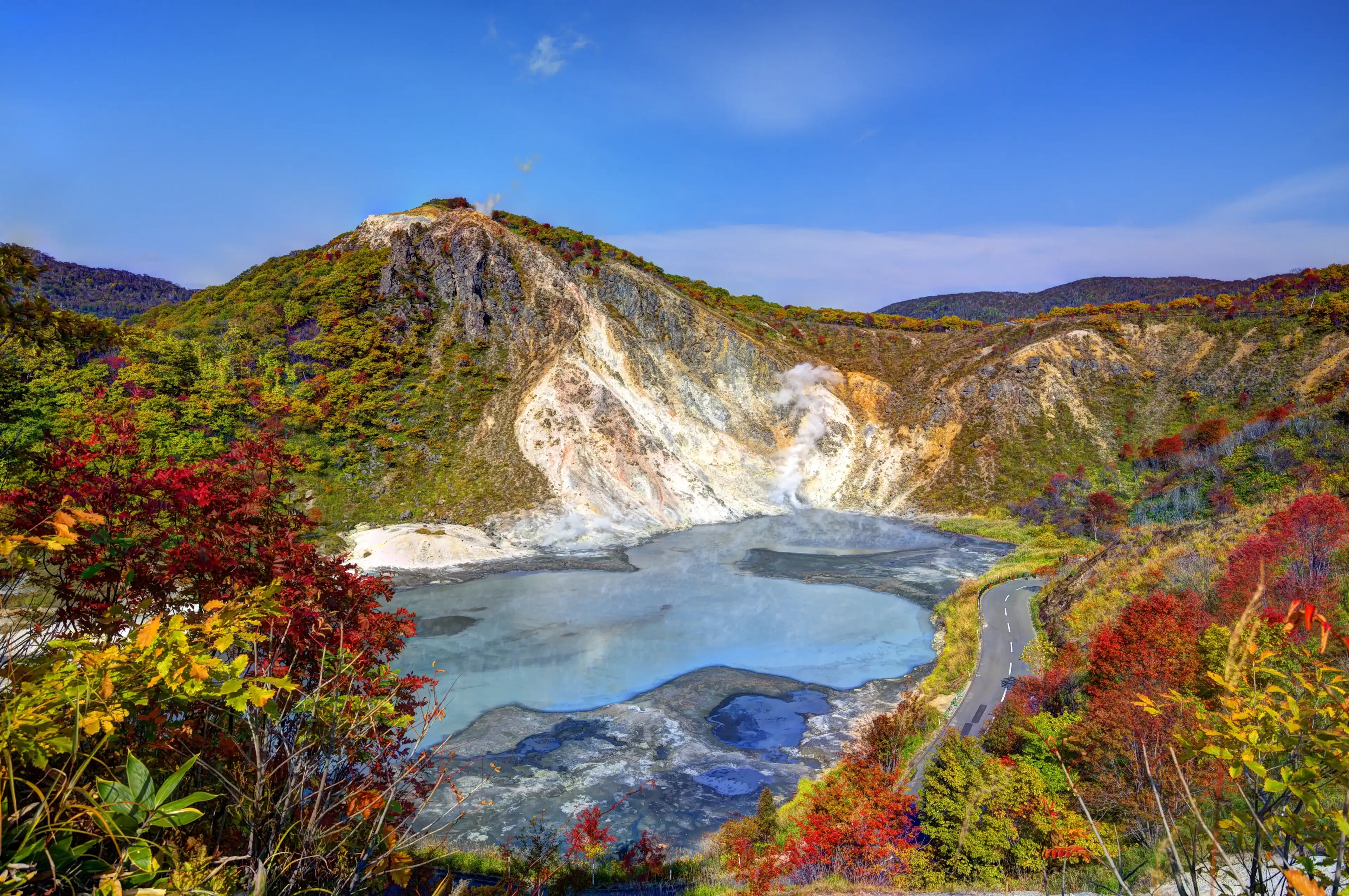 Lake Oyunuma in Noboribetsu, Hokkaido, Japan. THe water is sulfurous with surface temperatures reaching 50 degrees celsius. Lake Oyunuma in Noboribetsu, Hokkaido, Japan. THe water is sulfurous with surface temperatures reaching 50 degrees celsius.