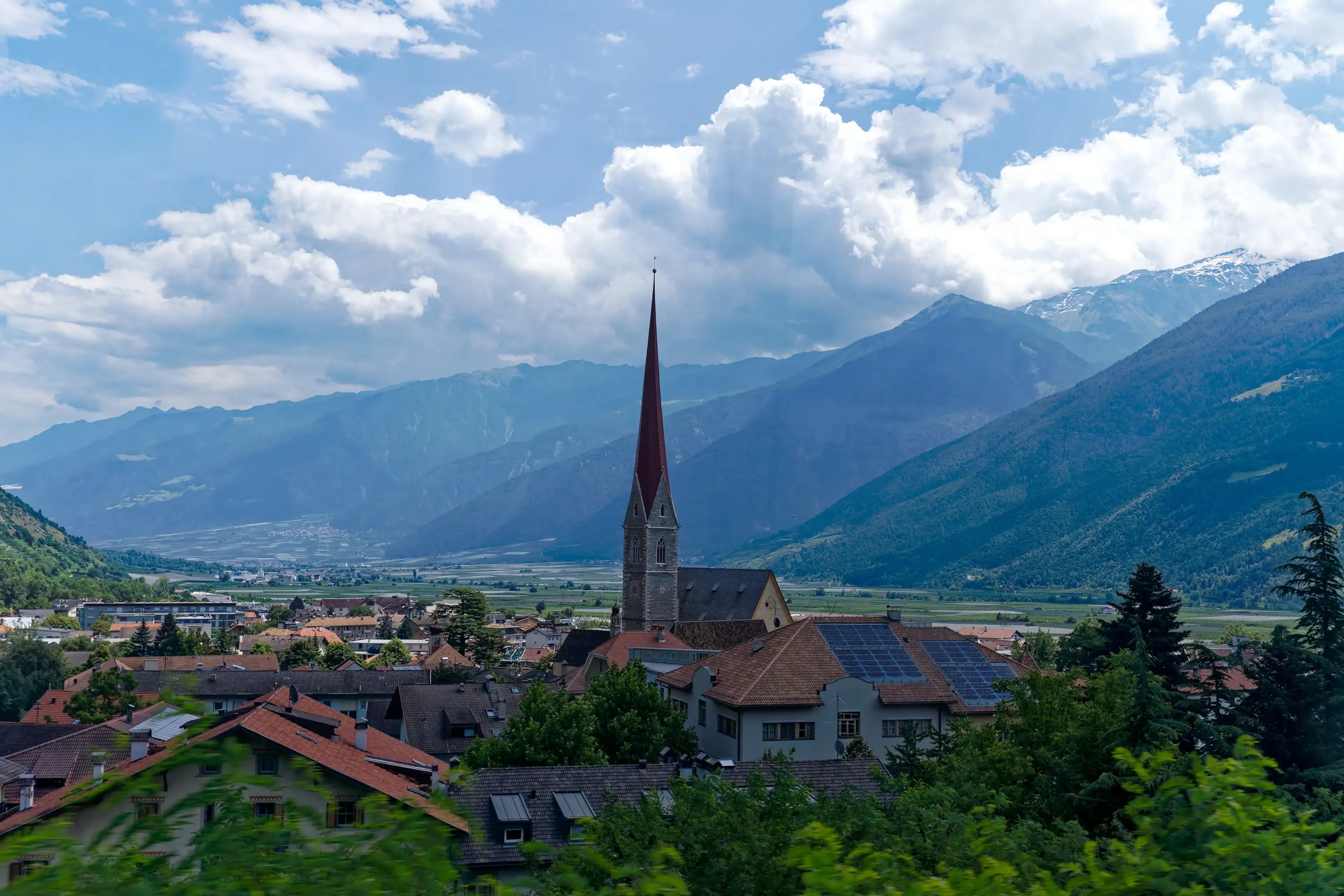 Scenic landscape with mountain panorama and Italian village of Lana at South Tyrol with Vinschgau Valley on a summer day. Photo taken July 15th, 2024, Lana, Italy. Scenic landscape with mountain panorama and Italian village of Lana at South Tyrol with Vinschgau Valley on a summer day. Photo taken July 15th, 2024, Lana, Italy.
