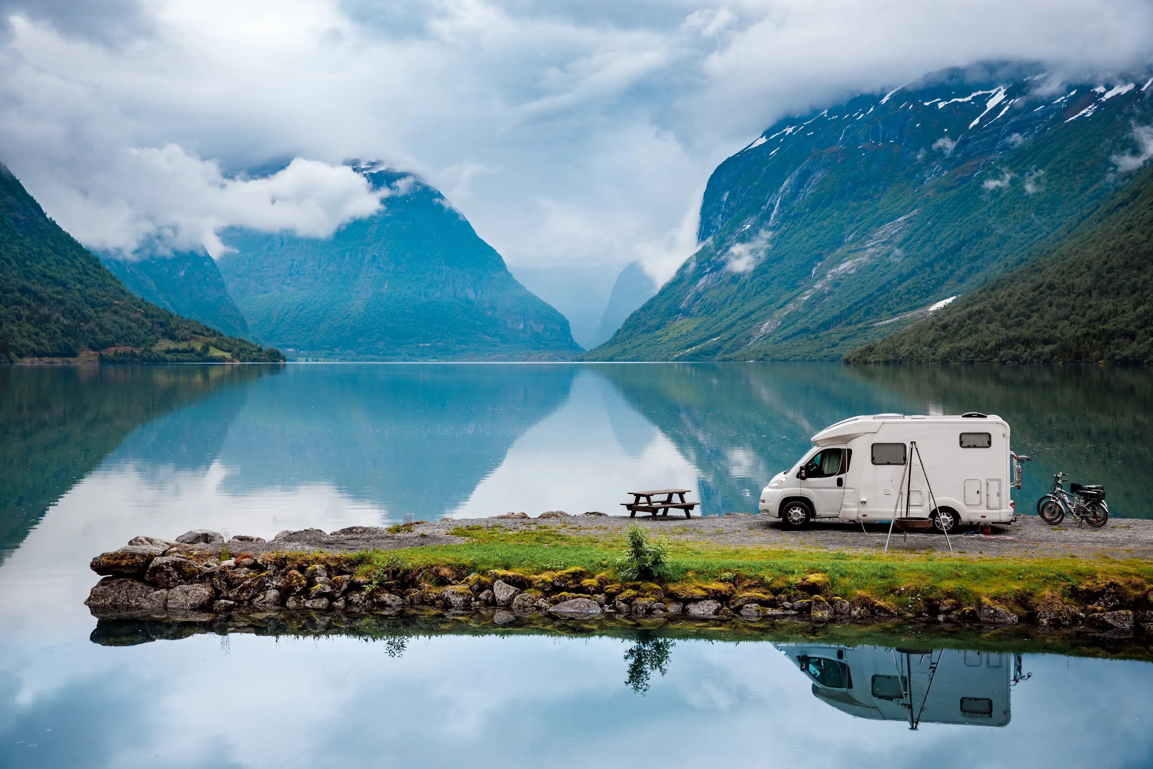 Family vacation travel, holiday trip in motorhome, Caravan car Vacation. Beautiful Nature Italy natural landscape Alps. Family vacation travel, holiday trip in motorhome, Caravan car Vacation. Beautiful Nature Italy natural landscape Alps.