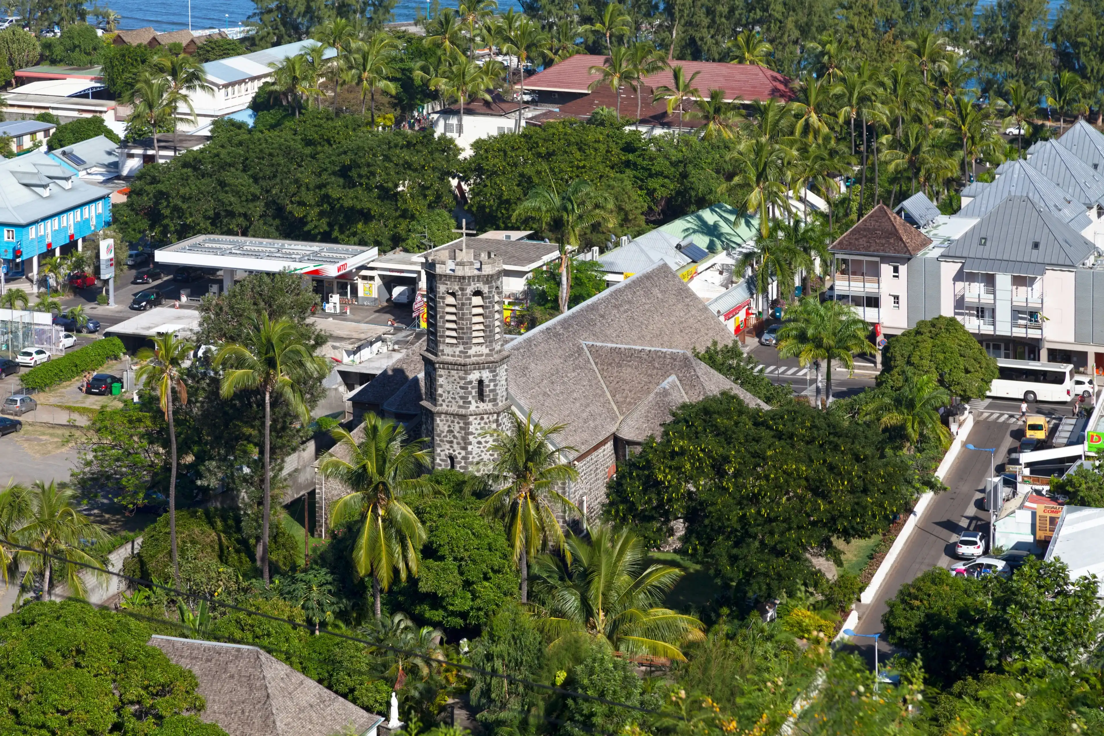Saint-Leu, La Réunion - June 15 2017: Aerial view of the church of Notre-Dame de la Salette. Saint-Leu, La Réunion - June 15 2017: Aerial view of the church of Notre-Dame de la Salette.