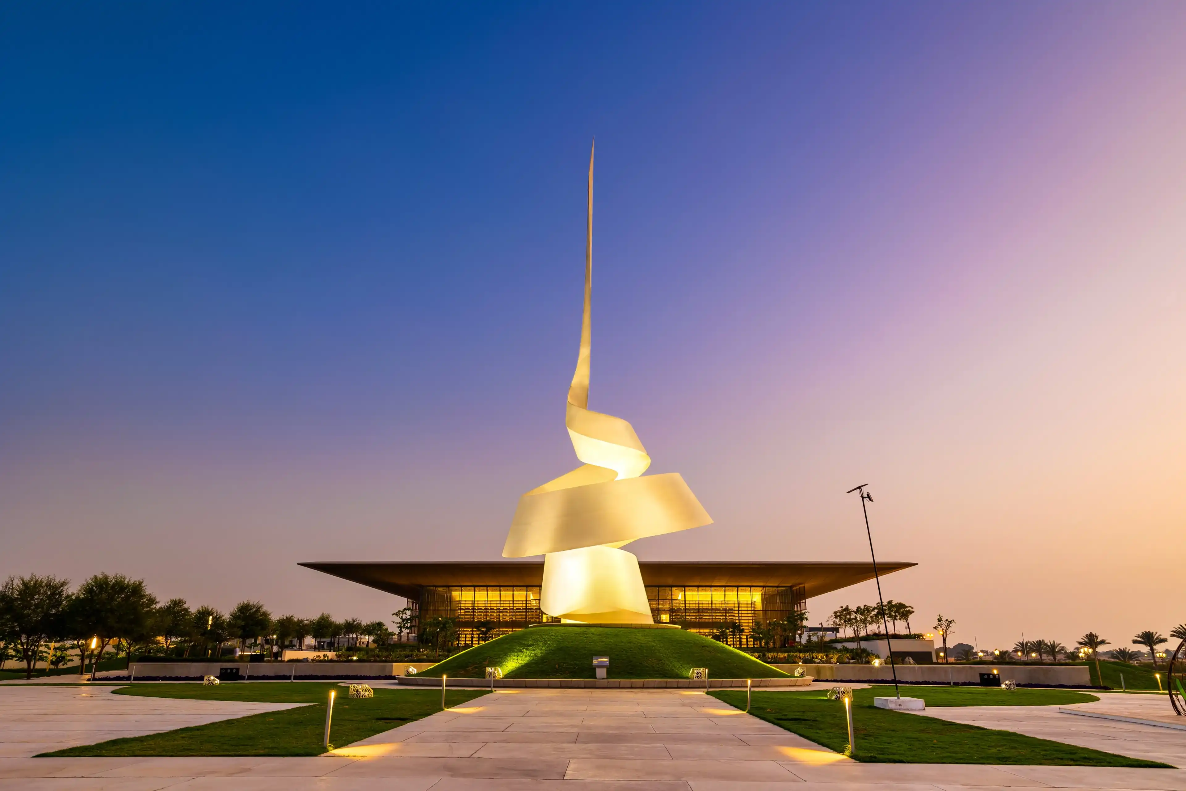 Sharjah, UAE - March 30 2022: Beautiful shot of Sharjah House of Wisdom in the evening. House of Wisdom is a new and hi tech digital library which is in Sharjah, UAE. Sharjah, UAE - March 30 2022: Beautiful shot of Sharjah House of Wisdom in the evening. House of Wisdom is a new and hi tech digital library which is in Sharjah, UAE.