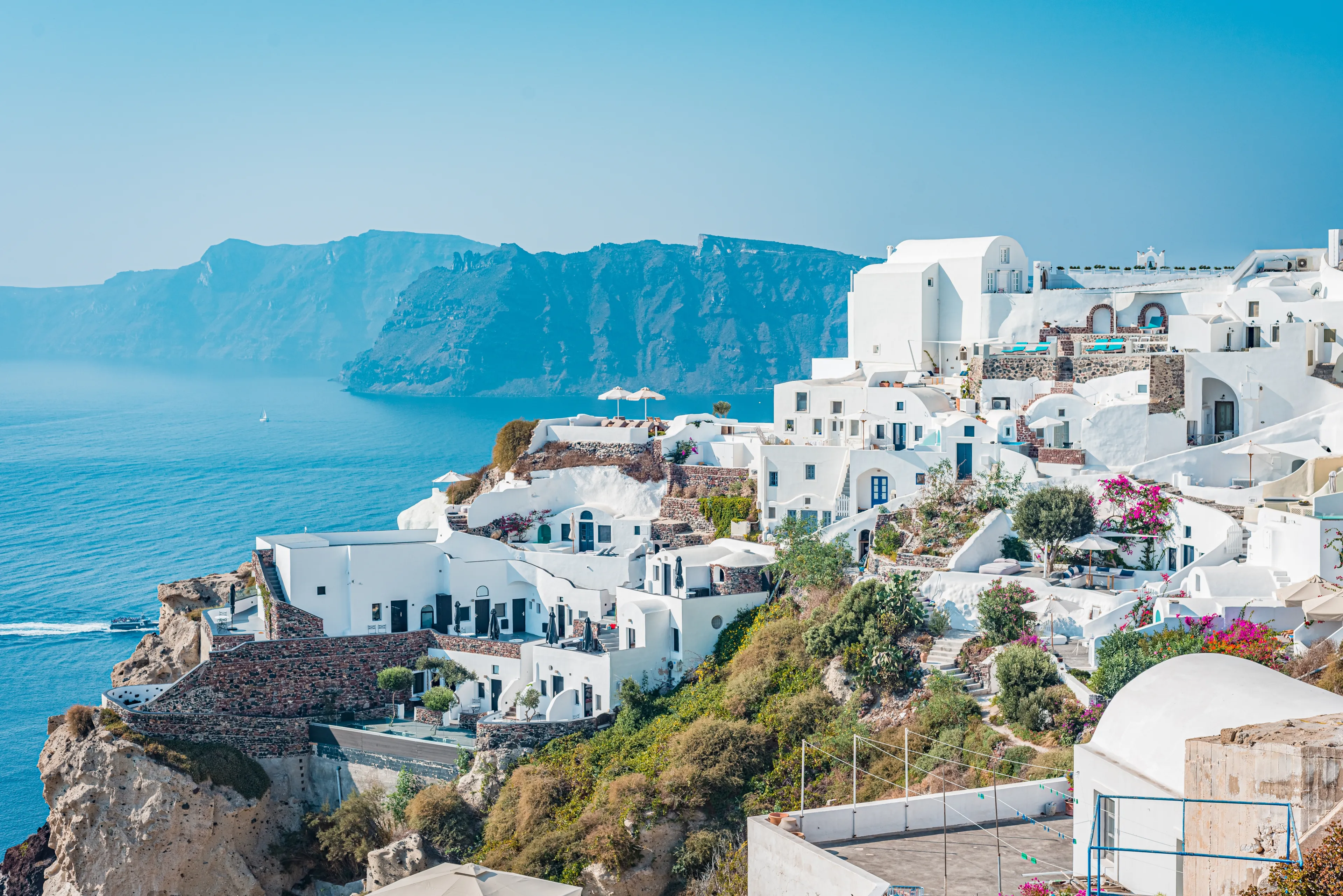 Oia views, an iconic sunset feature of the Greek island of Santorini in Cyclades Archipelago, Aegean Sea, Greece.