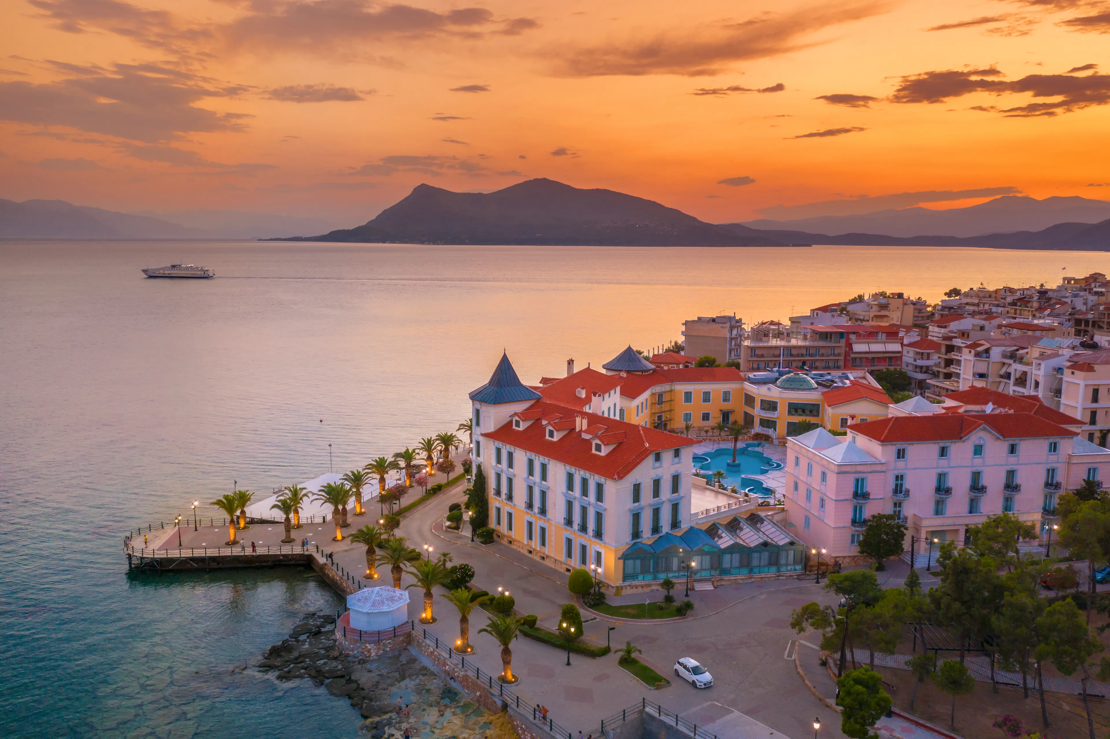 Sunset at the Greek spa resort with the hot springs of Loutra Edipsou on the island of Evia (Euboea) in the Aegean Sea
