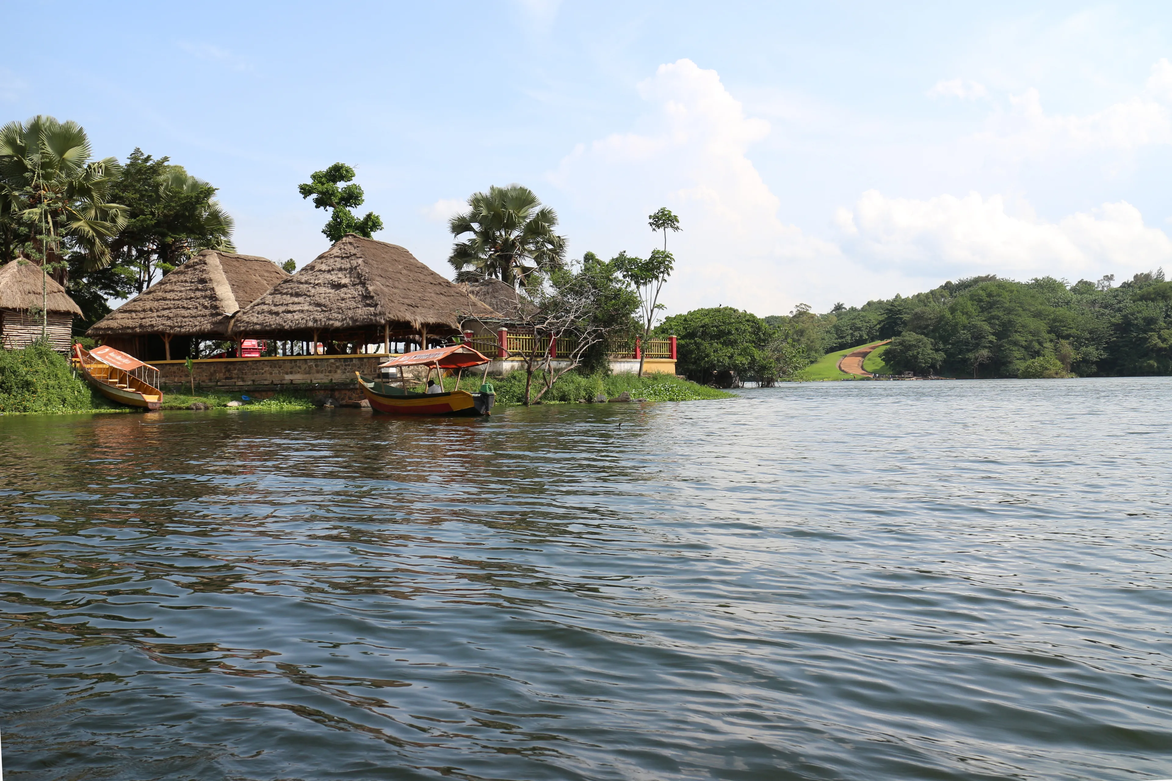 A small boat on the Nile river during sunset. Nile river. Jinja - Uganda