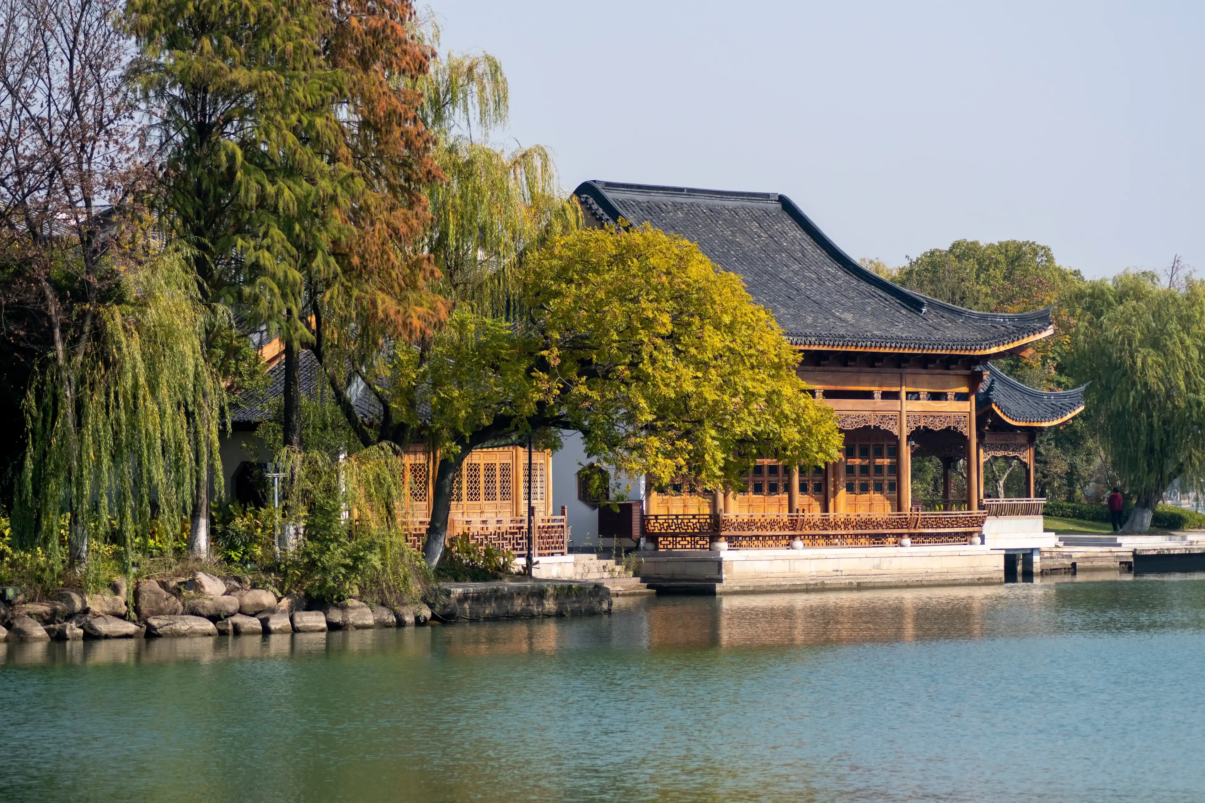 Jiaxing, China-28 Nov, 2023: Hou Gu Pagoda near South Lake of Jiaxing, China. It is located at the west side of South Lake. Jiaxing, China-28 Nov, 2023: Hou Gu Pagoda near South Lake of Jiaxing, China. It is located at the west side of South Lake.
