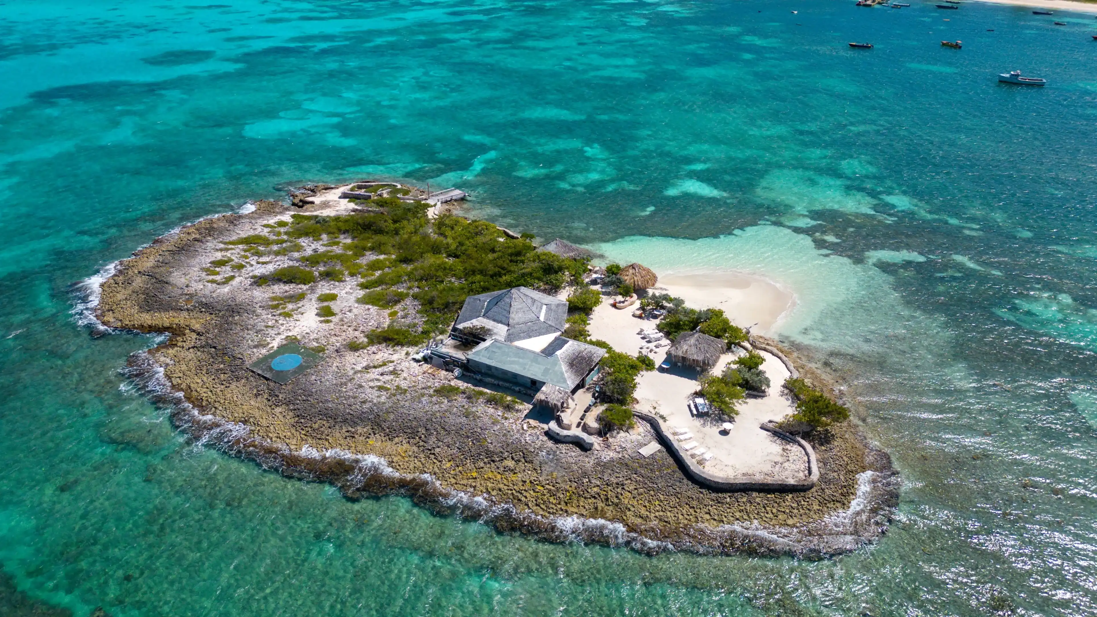 Scilly Cay, Island Harbor, Anguilla. Drone shot on a beautiful sunny day in the Caribbean. Turquoise blue sea with crystal clear and calm waters. Beautiful corals for snorkelling. Scilly Cay, Island Harbor, Anguilla. Drone shot on a beautiful sunny day in the Caribbean. Turquoise blue sea with crystal clear and calm waters. Beautiful corals for snorkelling.