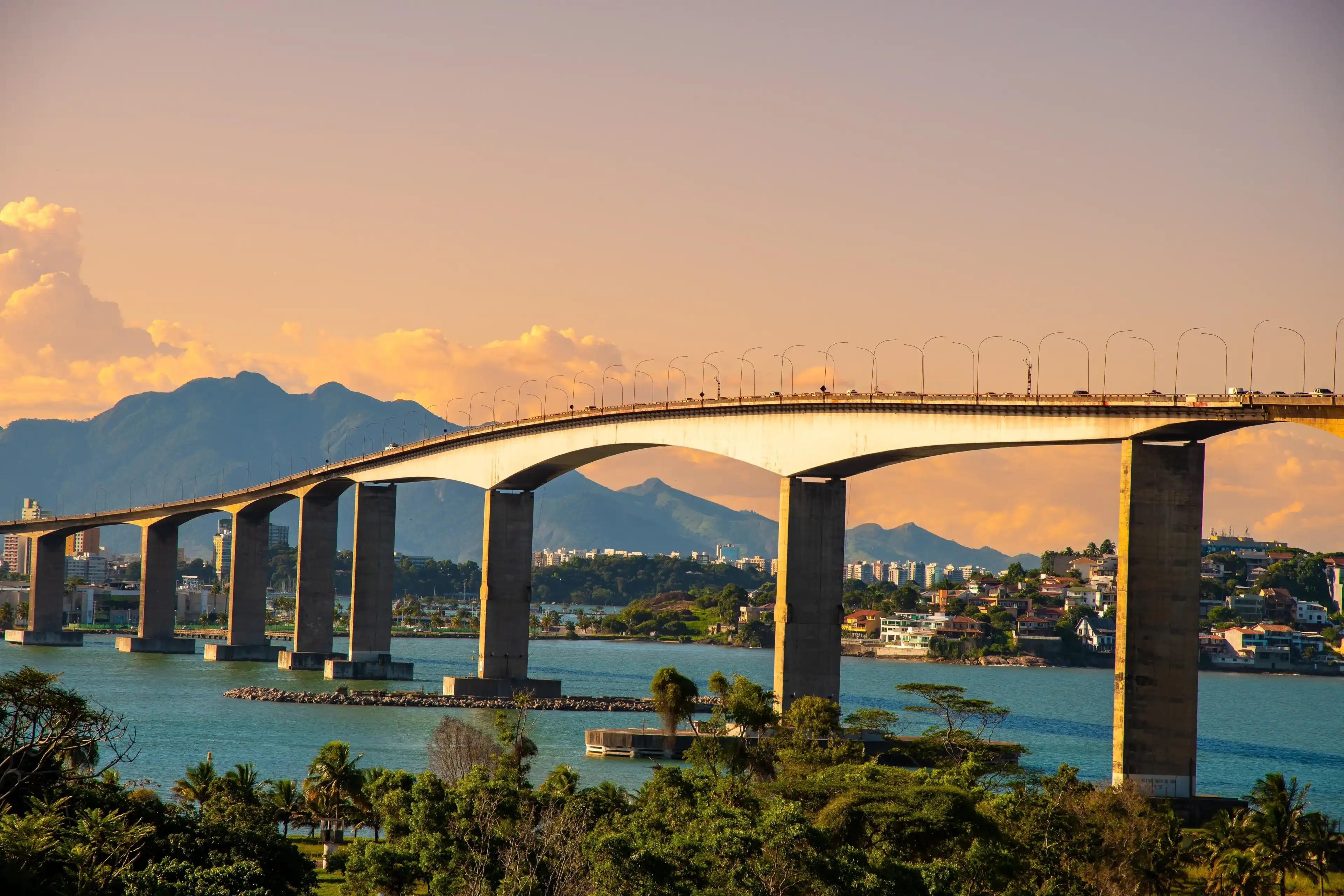 Sunset at Terceira Ponte (Third Bridge) located in Espírito Santo State, Brazil. Bridge that connects the capital Vitória to the city of Vila Velha. Sunset at Terceira Ponte (Third Bridge) located in Espírito Santo State, Brazil. Bridge that connects the capital Vitória to the city of Vila Velha.