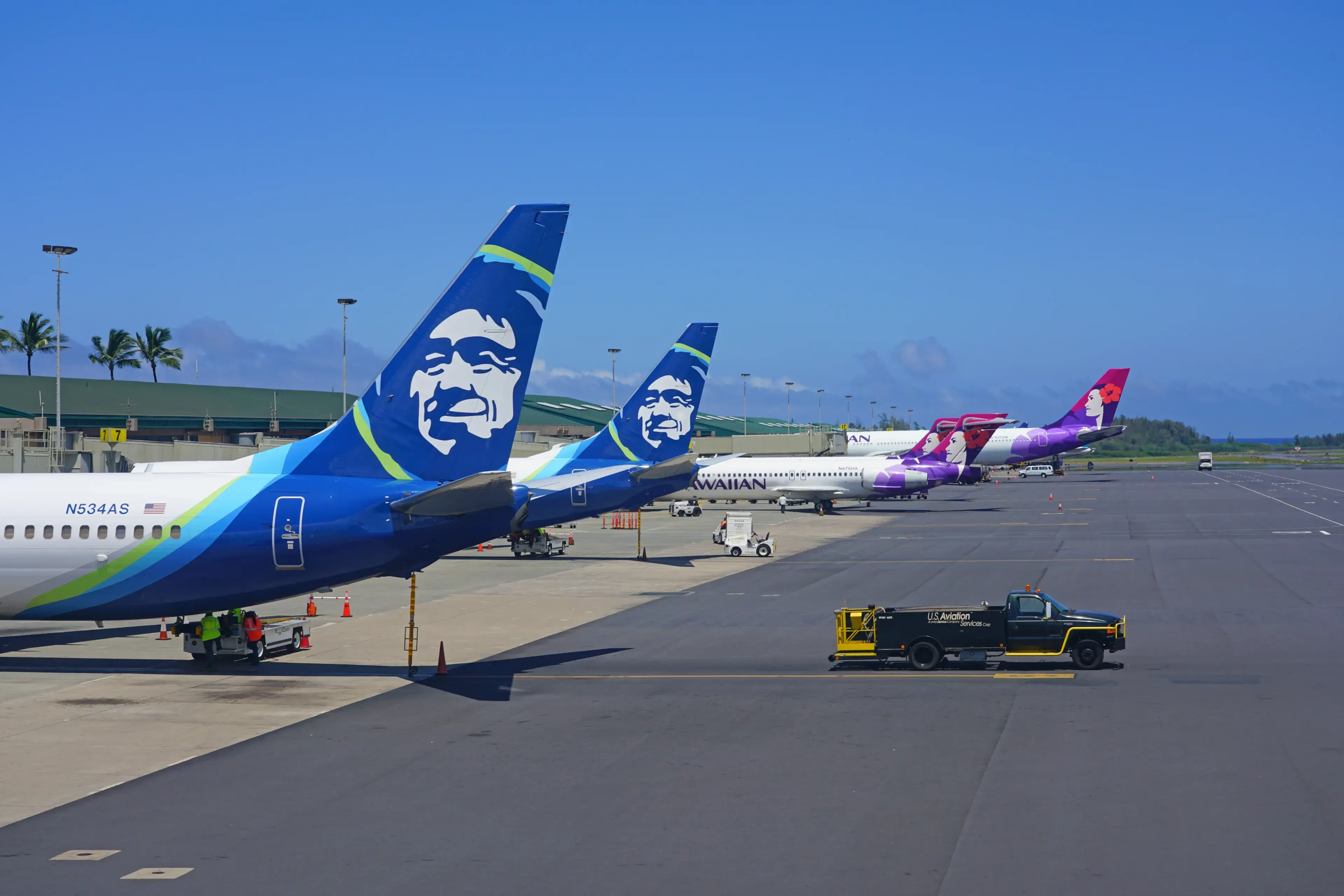 KAHULUI, HI -29 MAR 2018- An airplane from Alaska Airlines (AS) at the Kahului Airport (OGG) on the island of Maui in Hawaii near the Haleakala volcano. KAHULUI, HI -29 MAR 2018- An airplane from Alaska Airlines (AS) at the Kahului Airport (OGG) on the island of Maui in Hawaii near the Haleakala volcano.