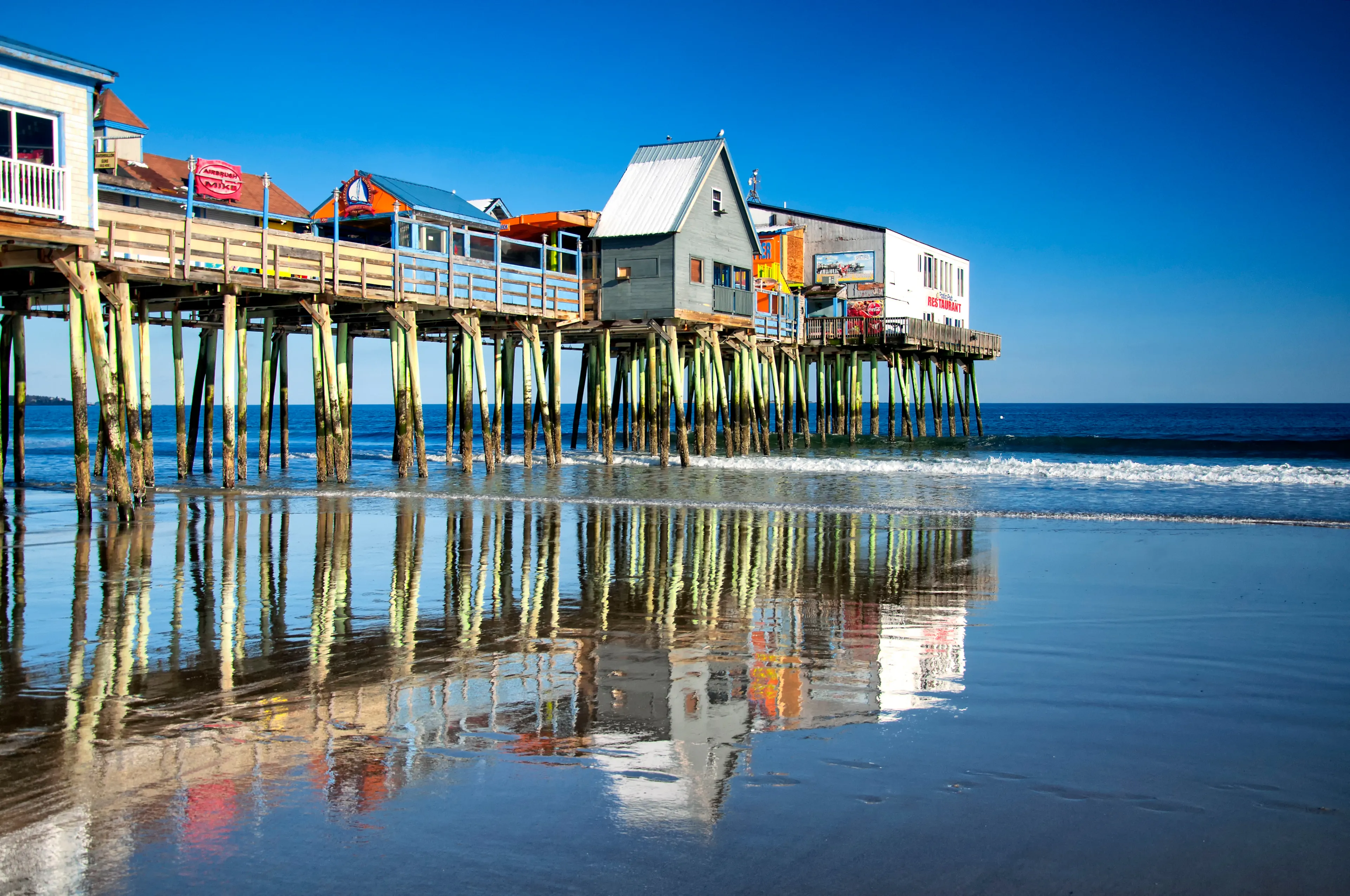 Old Orchard Beach, Maine. February 17, 2018. The iconic old orchard beach pier in Maine on a sunny winter day in New England.