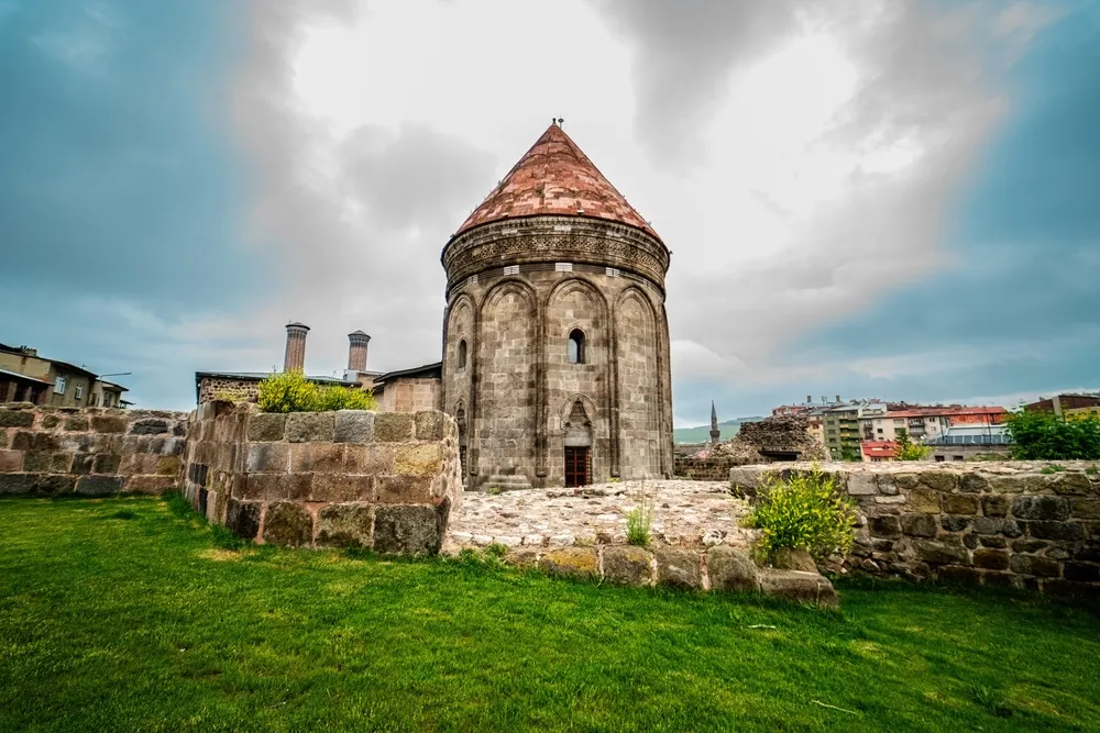 Photo of the dome taken among green grass. Close-up of the dome. Erzurum, Turkey.