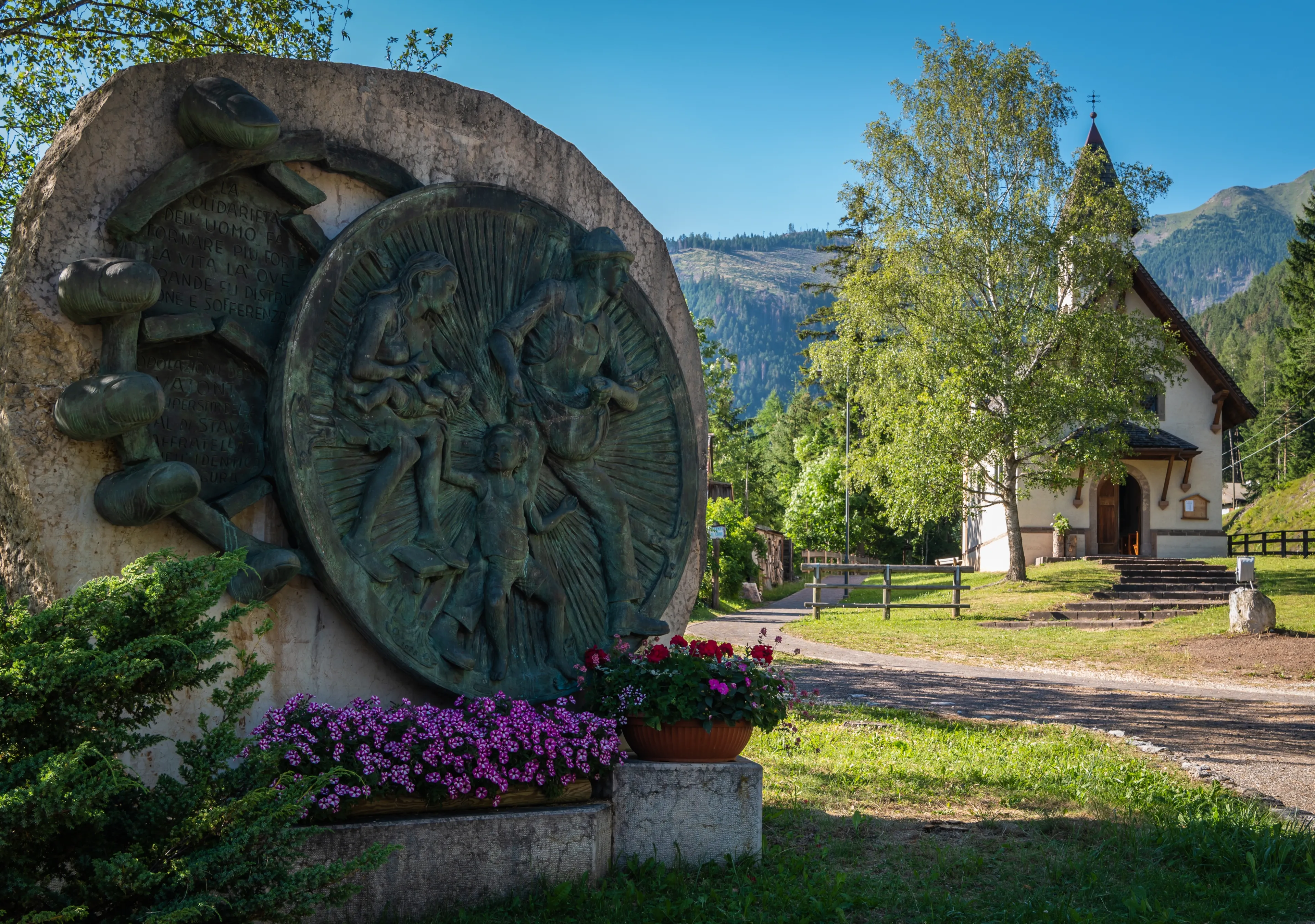 monument which was donated to the survivors of the Val di Stava by the Populations of Vajont "brothers in the same disaster". Stava Valley, Tesero, Trentino Alto Adige italy- 13 juli 2022