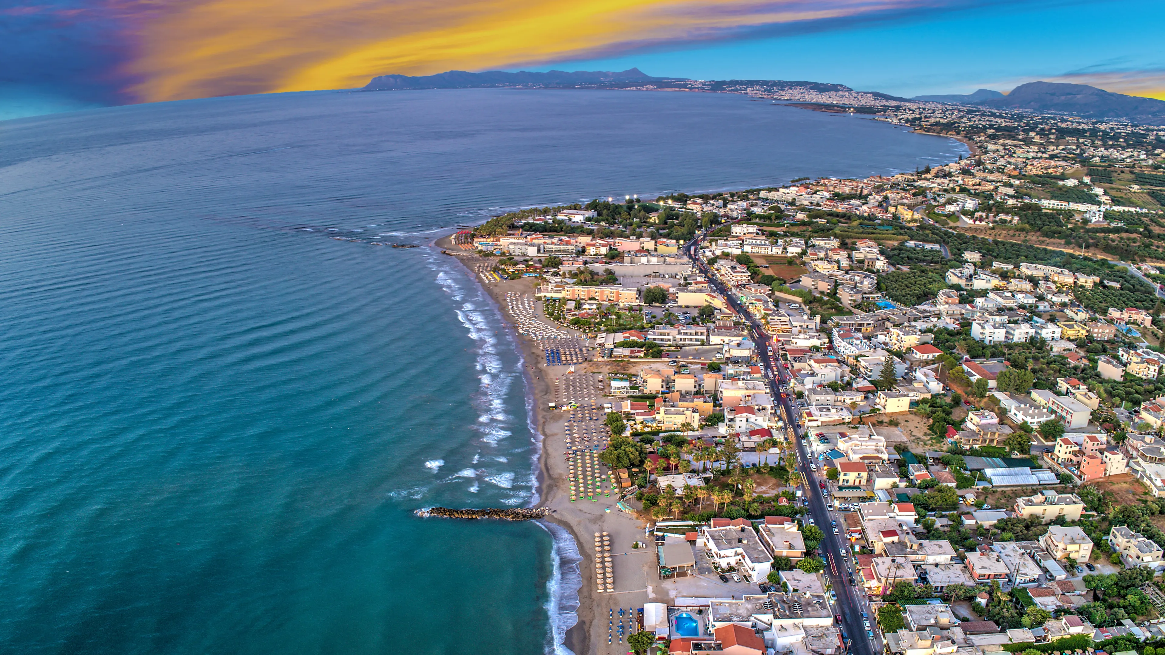 Panoramic view Agia Marina is town on island of Crete in Greece. aerial view from drone. Turquoise water. Nea Kydonia. Platanias Beach on sea Crete. Kolpos Chanion