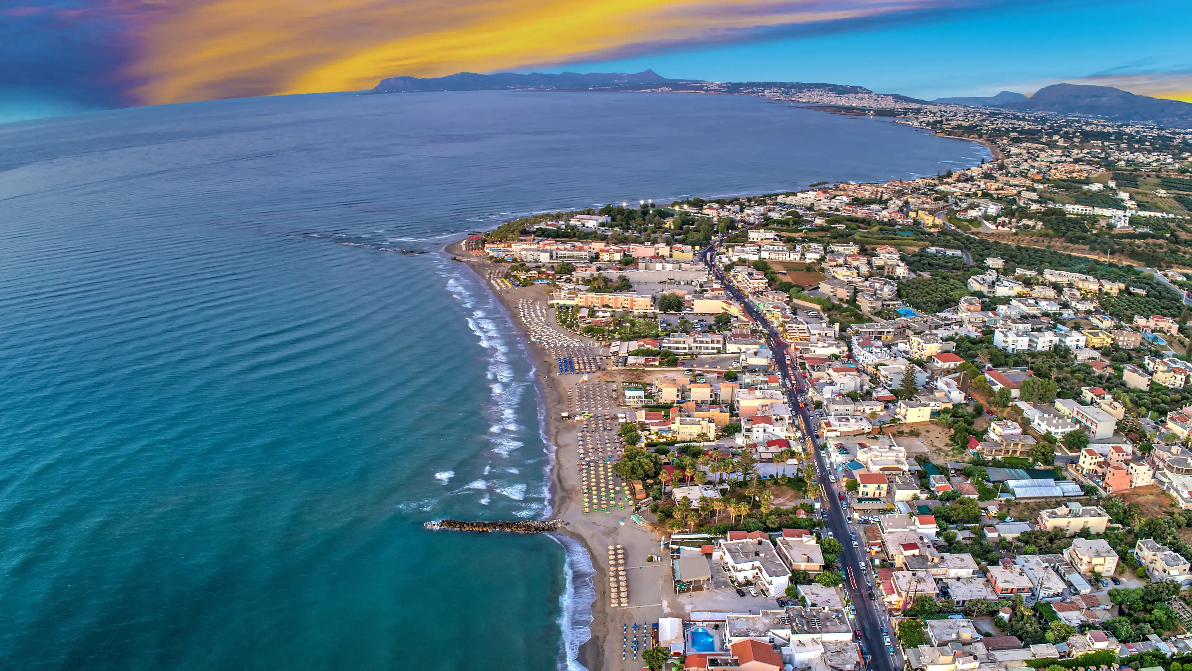 Panoramic view Agia Marina is town on island of Crete in Greece. aerial view from drone. Turquoise water. Nea Kydonia. Platanias Beach on sea Crete. Kolpos Chanion Panoramic view Agia Marina is town on island of Crete in Greece. aerial view from drone. Turquoise water. Nea Kydonia. Platanias Beach on sea Crete. Kolpos Chanion