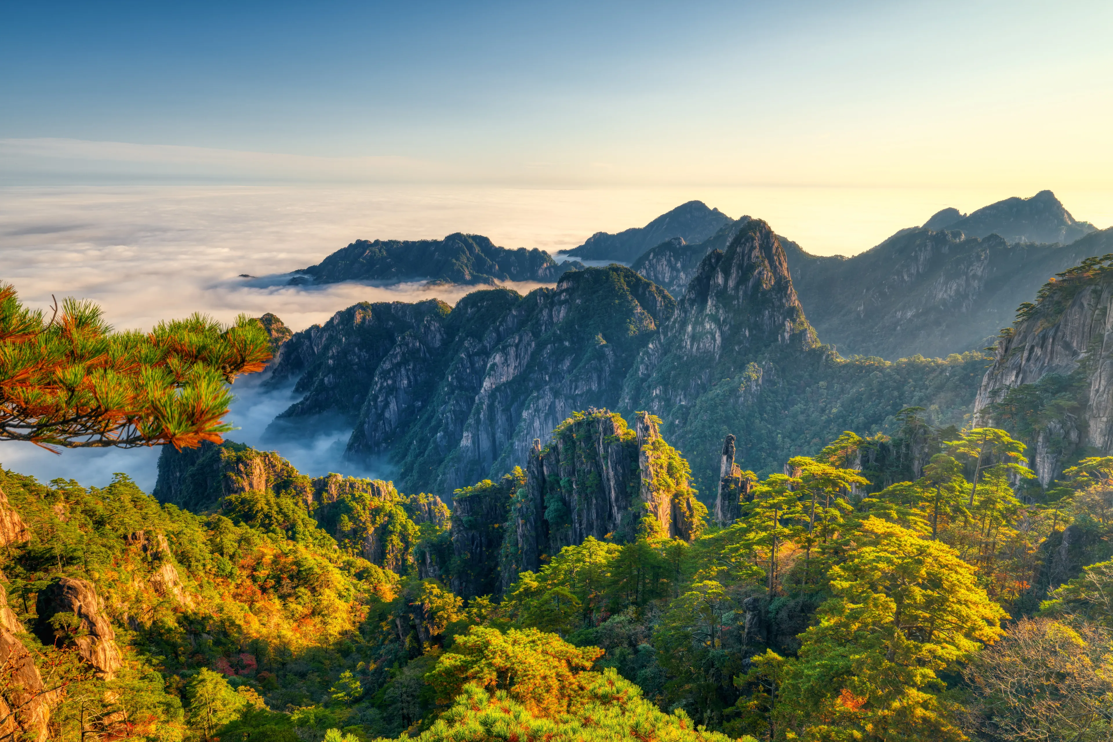 Sea of ​​clouds under the sunset, at Huangshan Mountain.