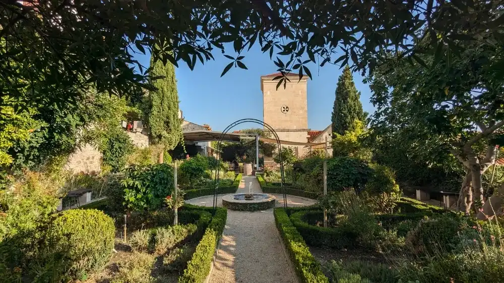 Šibenik, Croatia - 4th September 2024 - medieval walled Mediterranean garden next to St. Lawrence Church and Monastery Šibenik, Croatia - 4th September 2024 - medieval walled Mediterranean garden next to St. Lawrence Church and Monastery