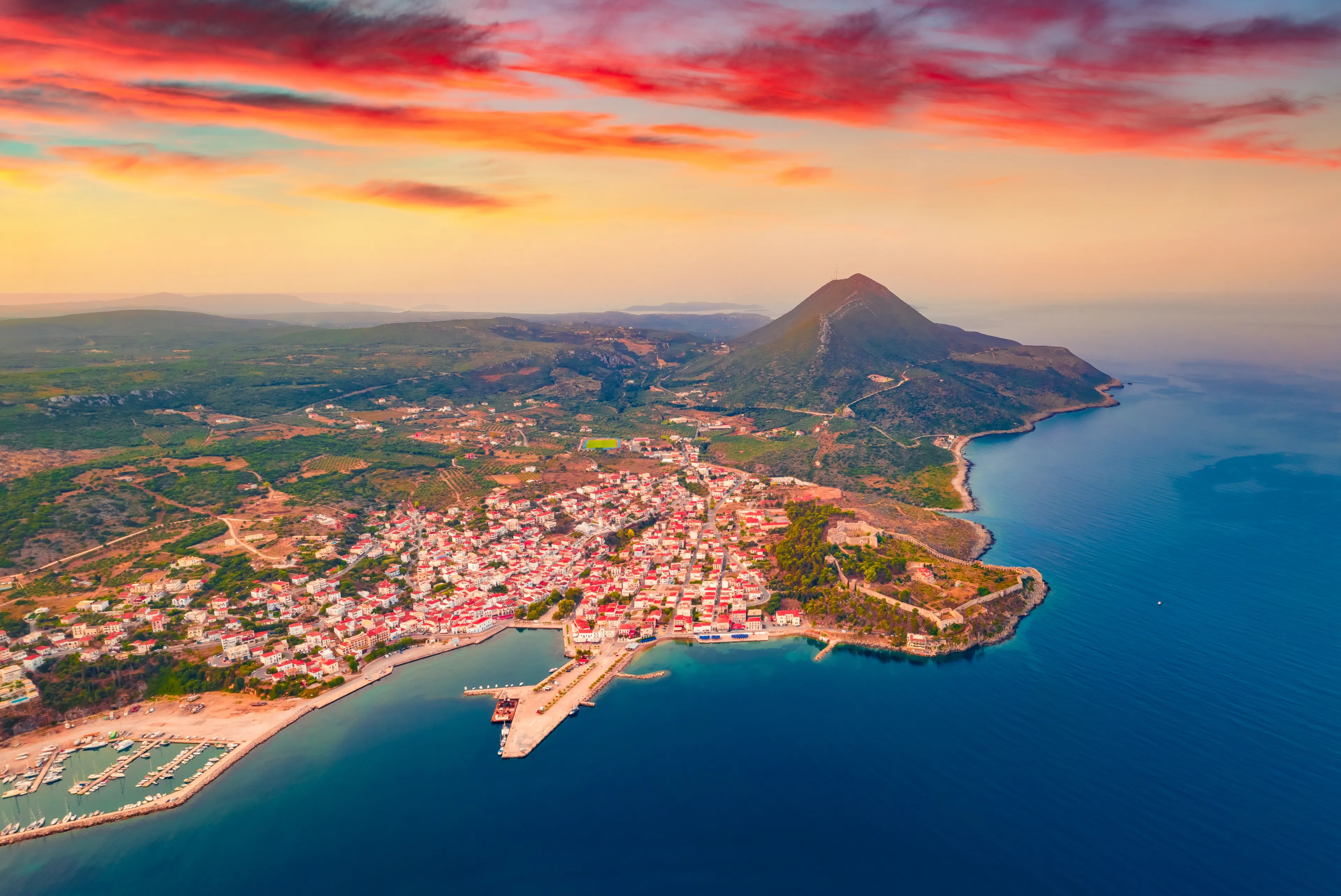 Wonderful summer view from flying drone of Pylos Castle. Spectacular summer cityscape of Pylos, Greece, Europe. Perfect sunrise on Peloponnese peninsula. Traveling concept background.