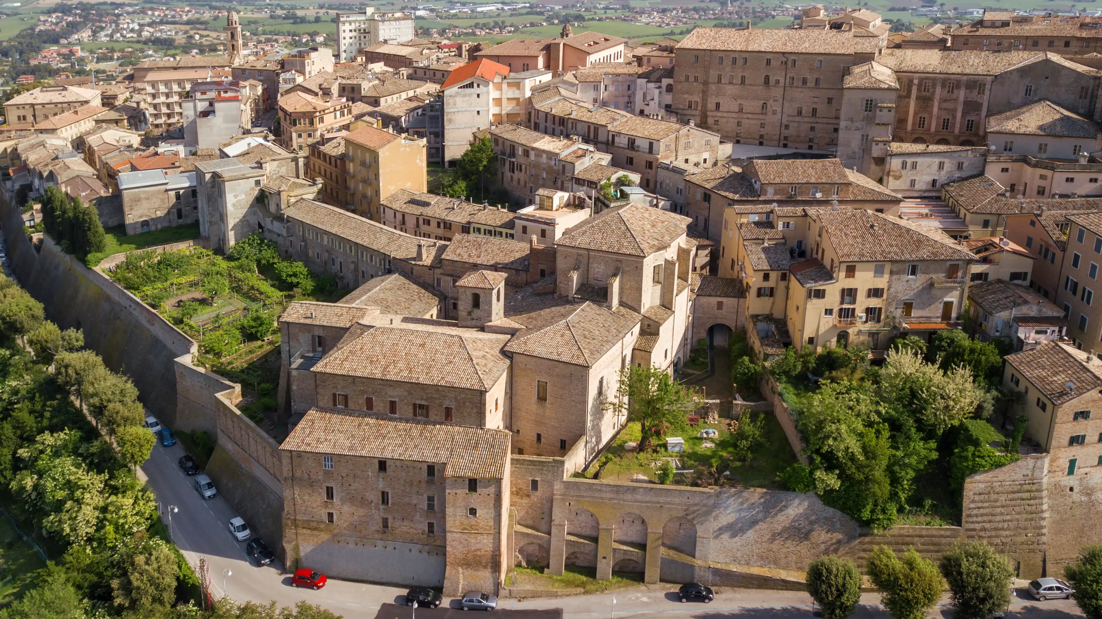 Aerial view of the municipality of Osimo, in the province of Ancona, in the Marche region, in Italy. The historic center, located on the highest hill of the city, called Gòmero, is a mountain tourist. Aerial view of the municipality of Osimo, in the province of Ancona, in the Marche region, in Italy. The historic center, located on the highest hill of the city, called Gòmero, is a mountain tourist.