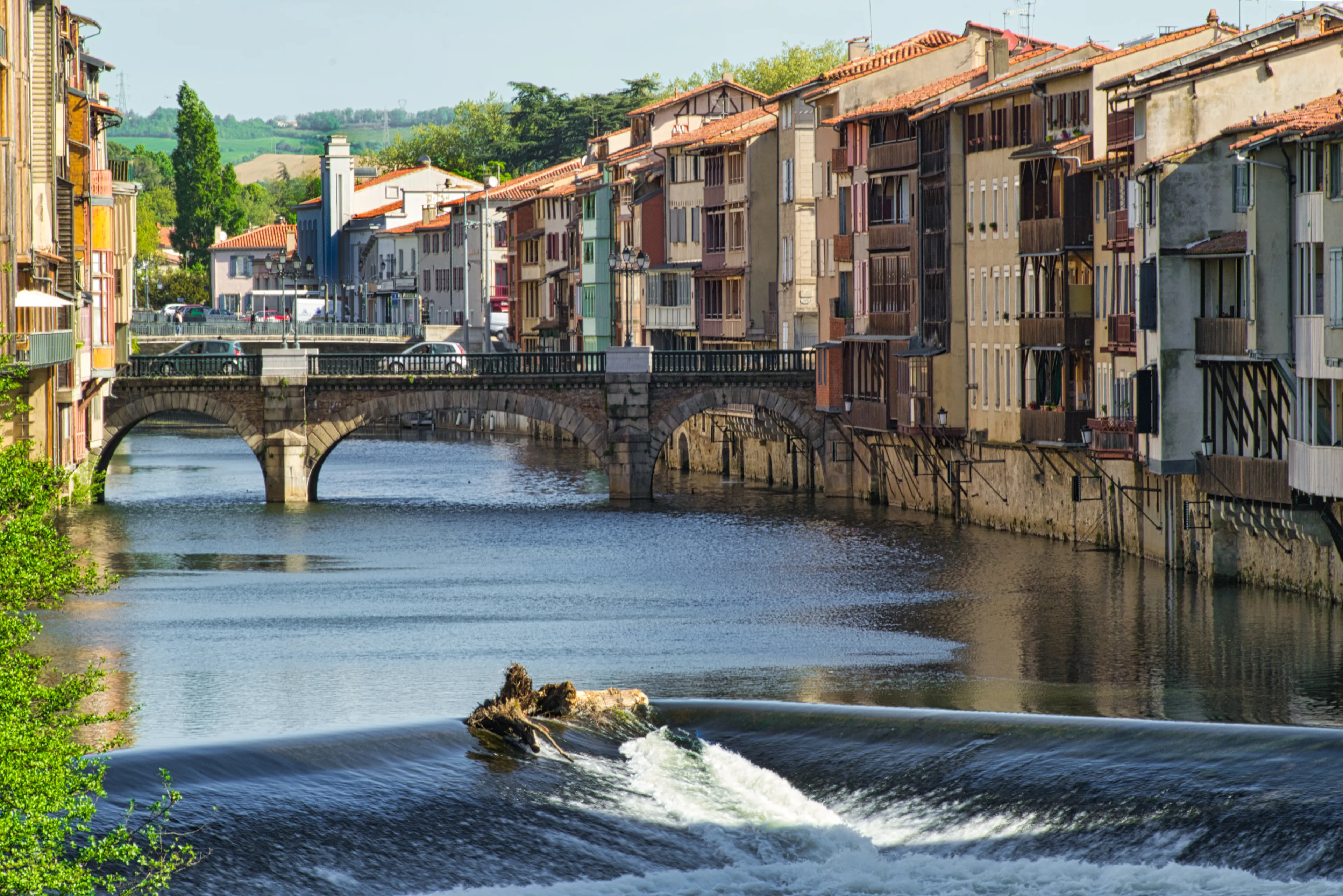Agout river in Castres, France, showing the old tanners' houses on the bank