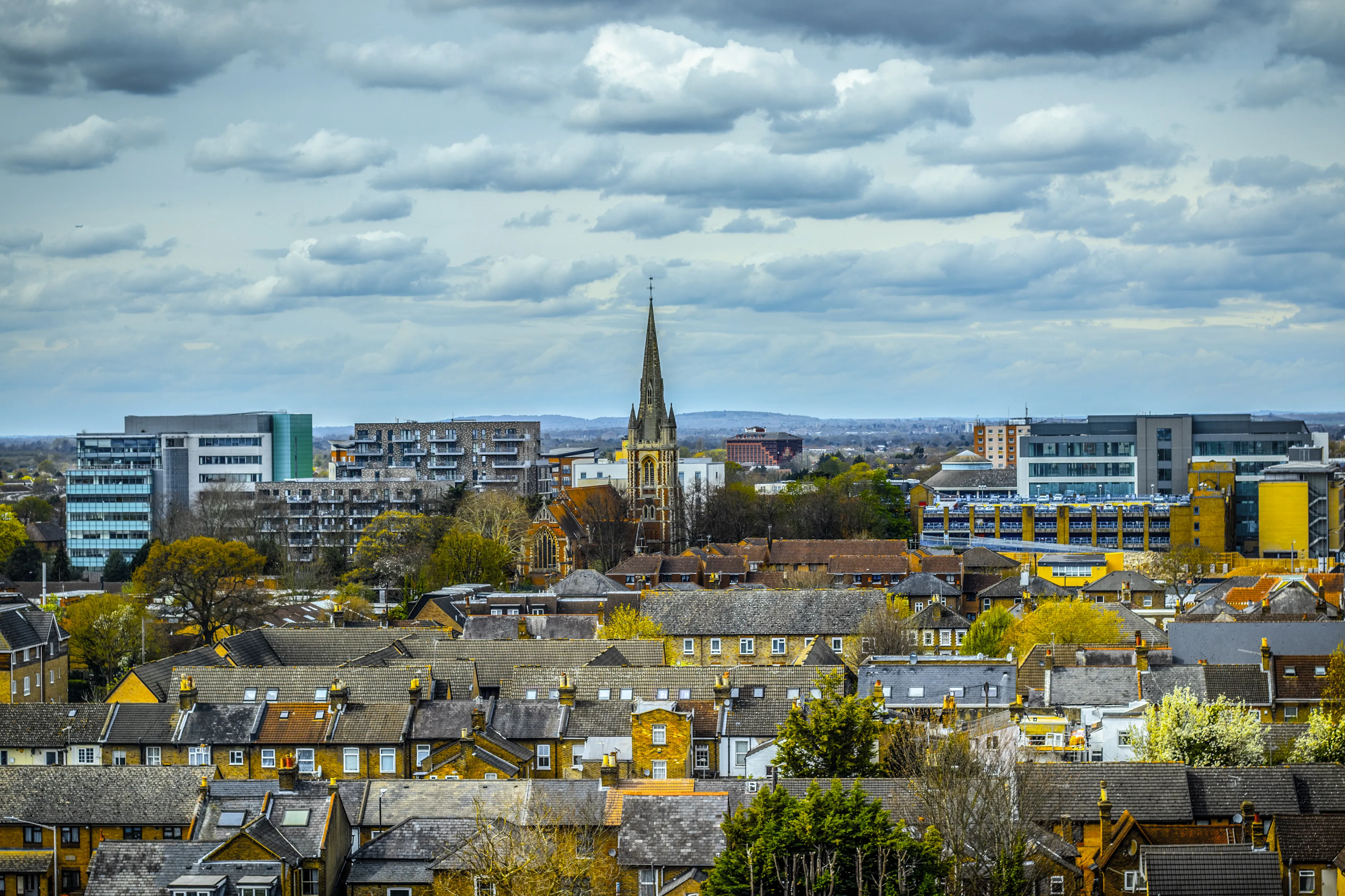  Slough ,England View of residential part of Slough. St Mary's church and modern Slough in the background . Aerial picture.