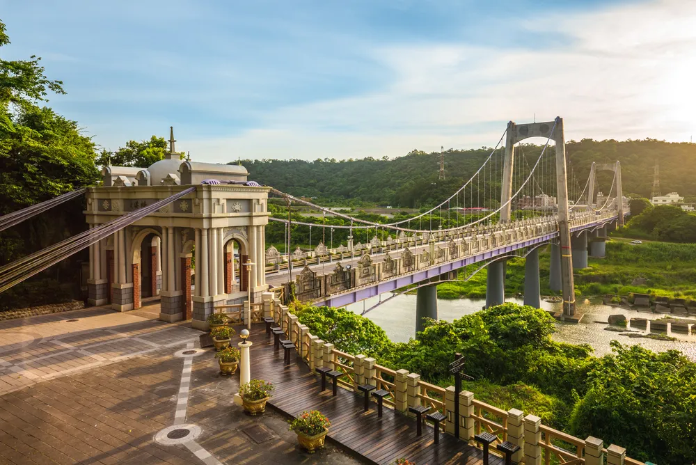 Daxi suspension bridge in taoyuan, taiwan. the translation of the chinese text is "Daxi Bridge"