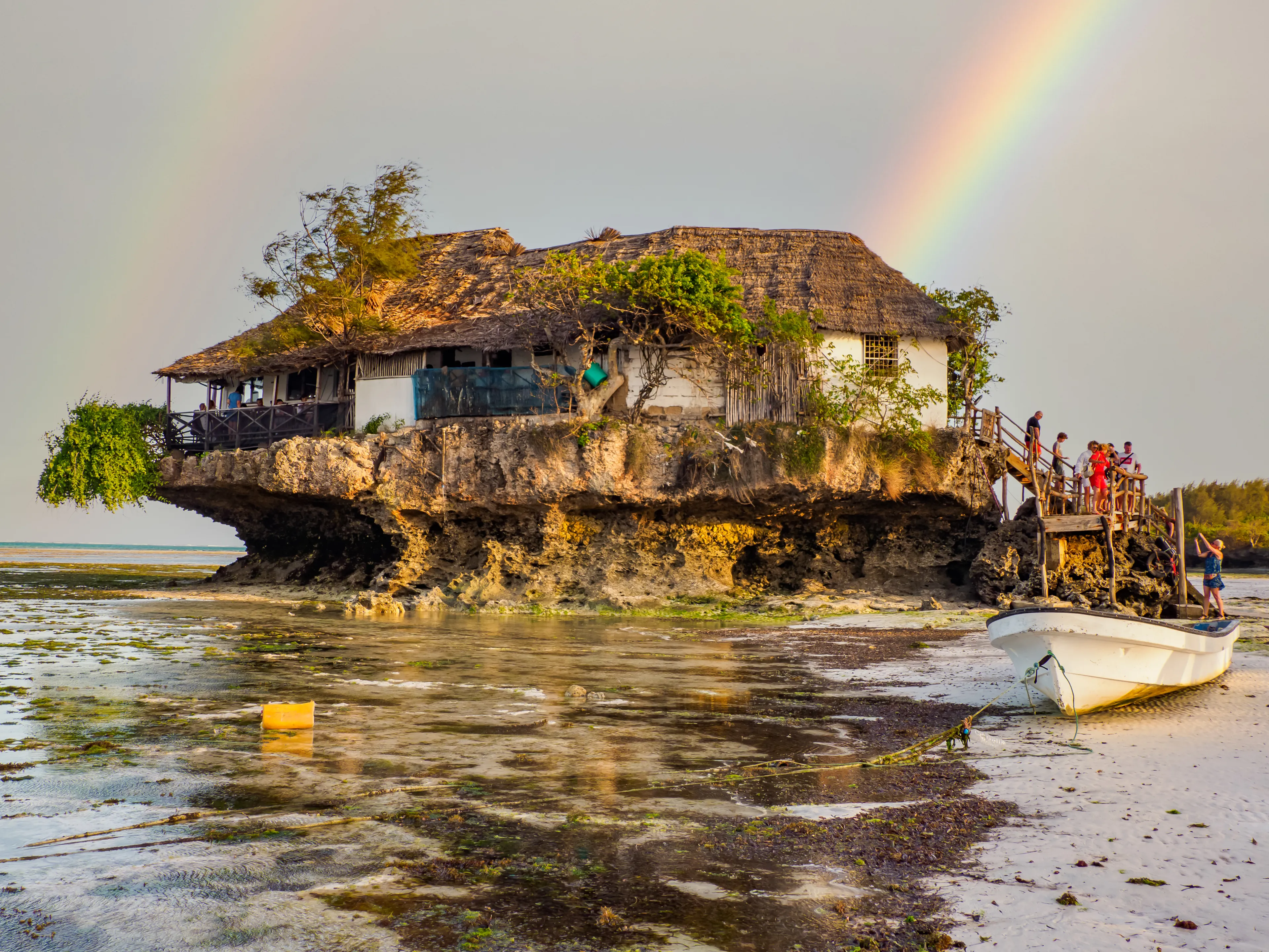 Michamvi, Tanzania - Feb, 2021: Famous 'The Rock' restaurant built on the cliff in the sea by the Pingwe beach at Zanzibar, Africa