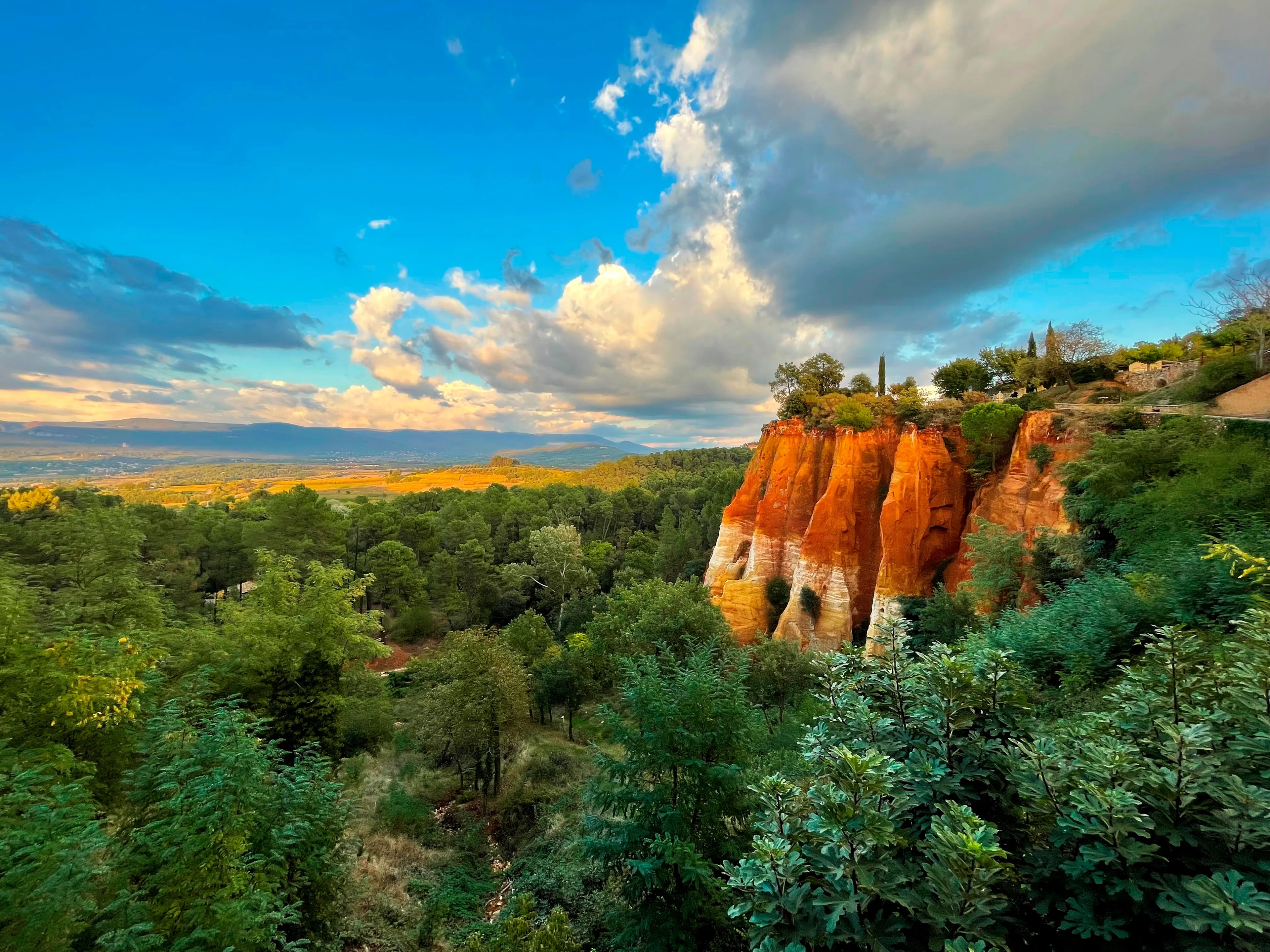 Roussillon's Ochre Cliffs. Nature's canvas painted with Provence's vivid hues.
