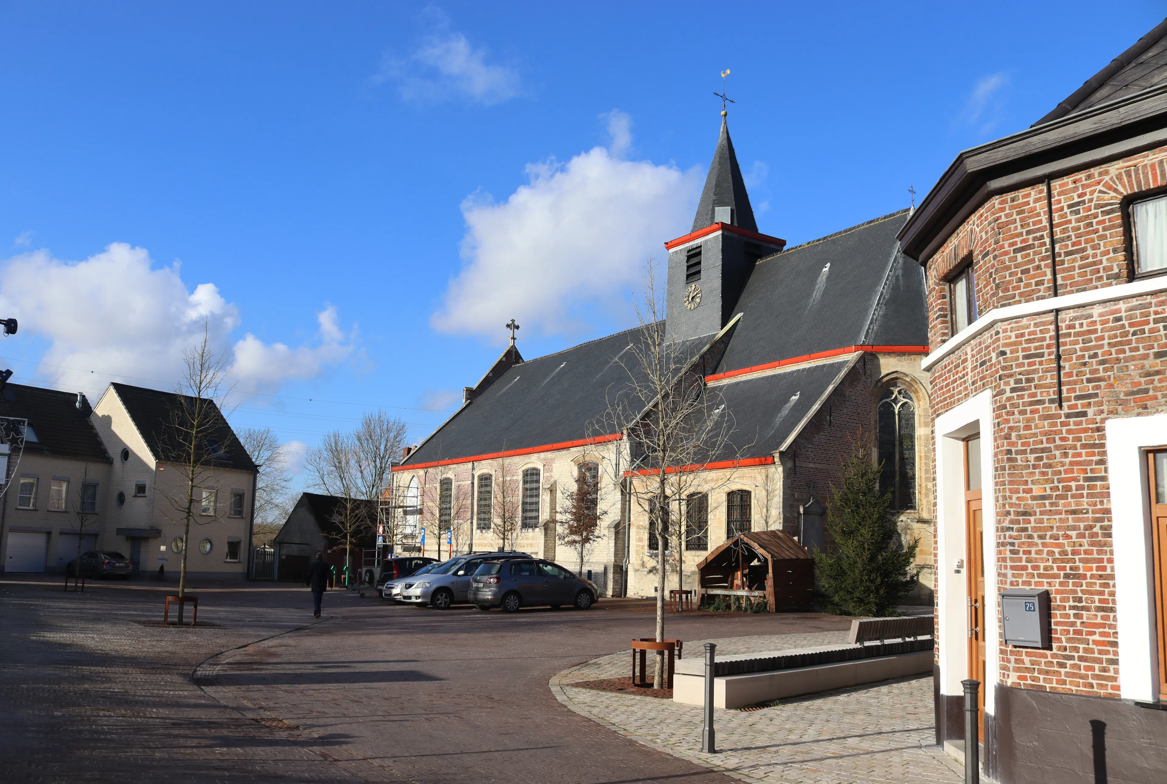 LEBBEKE, BELGIUM, 6 JANUARY 2022: The village center and church of Denderbelle near Lebbeke in Flanders. Denderbelle is a village in East Flanders next to the river Dender with a population of 2200.