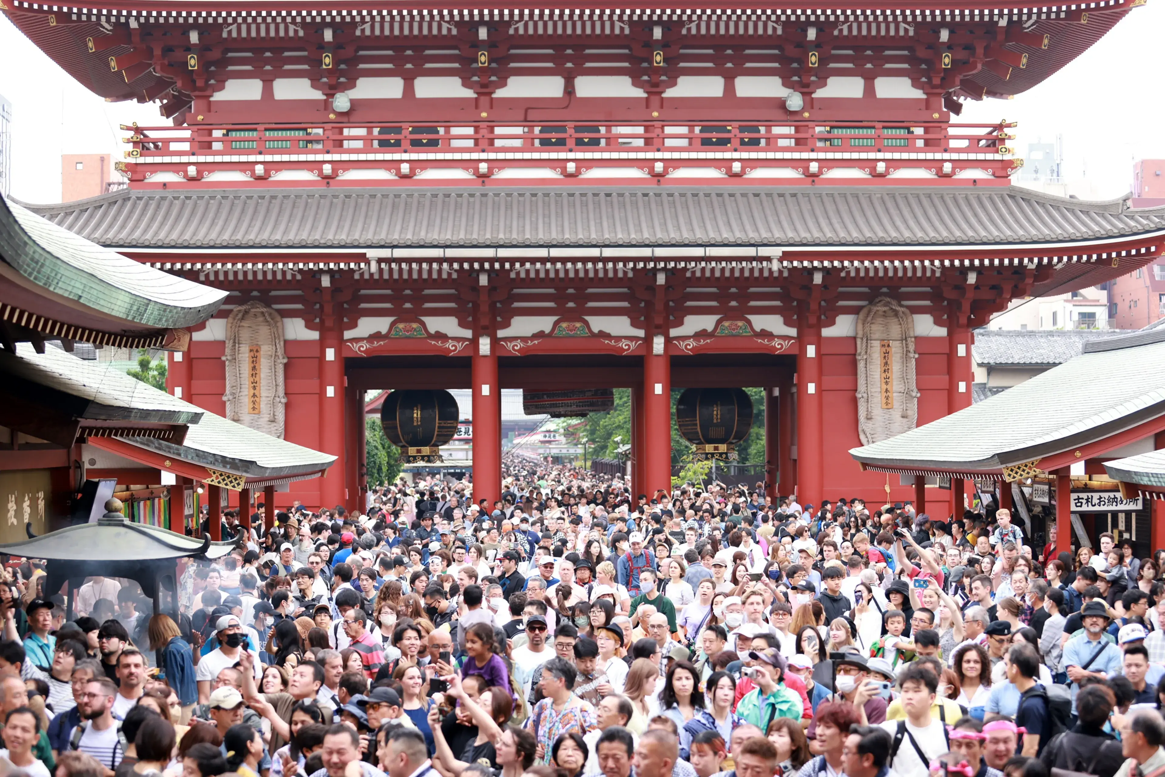 Tokyo - May 19 2024:crowded visitors in kannon temple in Sanja Festival. it is one of traditional festival,a weekend-long Shinto festival that is dedicated to the spirits of three men Tokyo - May 19 2024:crowded visitors in kannon temple in Sanja Festival. it is one of traditional festival,a weekend-long Shinto festival that is dedicated to the spirits of three men