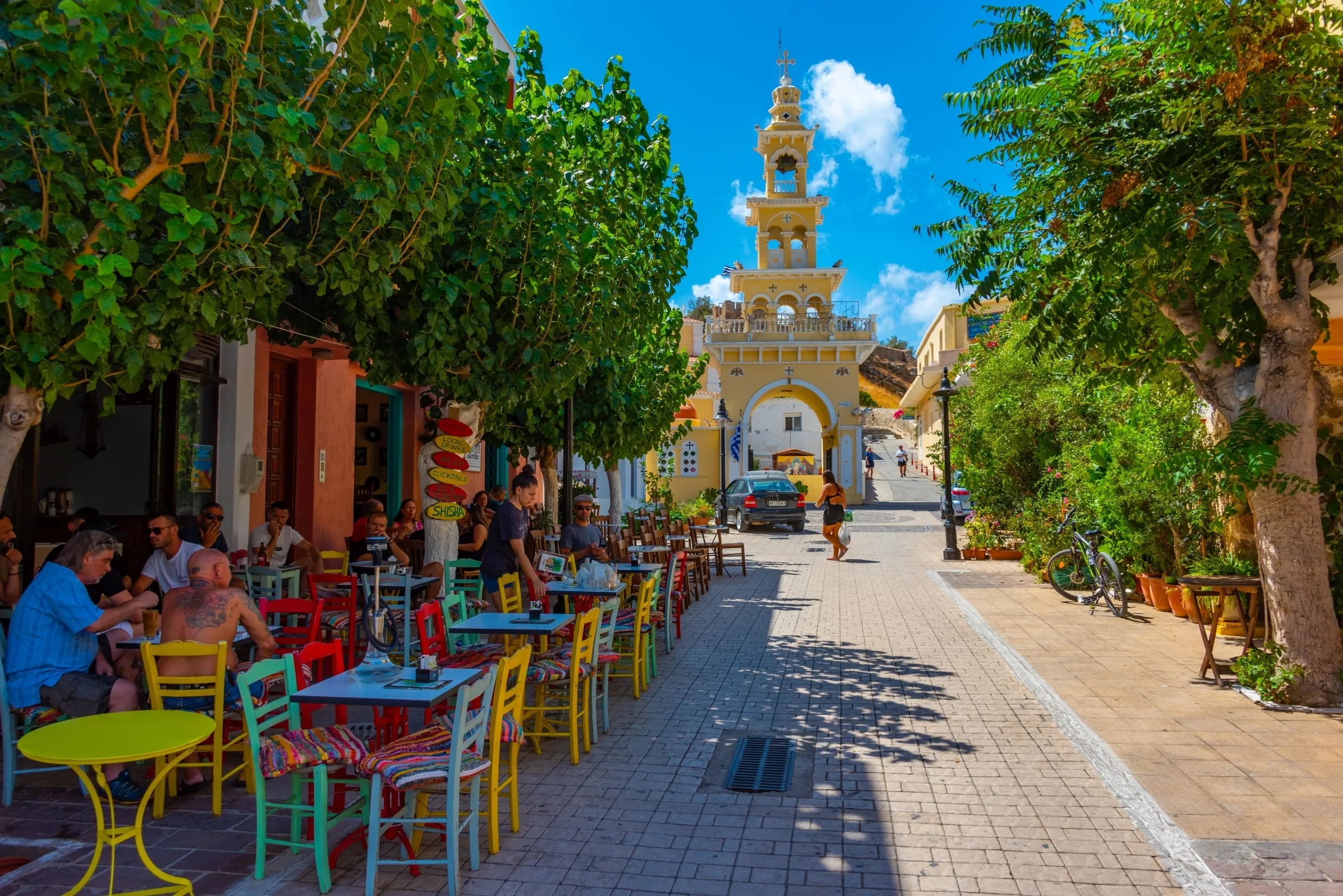 Palaiochora, Greece, August 21, 2022: People are strolling at a tourist street in Greek town Palaiochora at Crete island.
