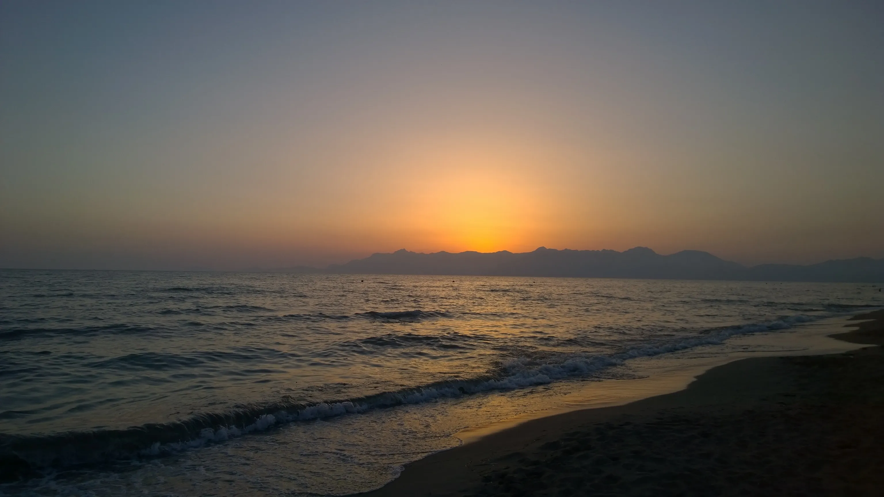 Pontecagnano sea sunset above the montains summer, calm Tyrrhenian sea, South Italy