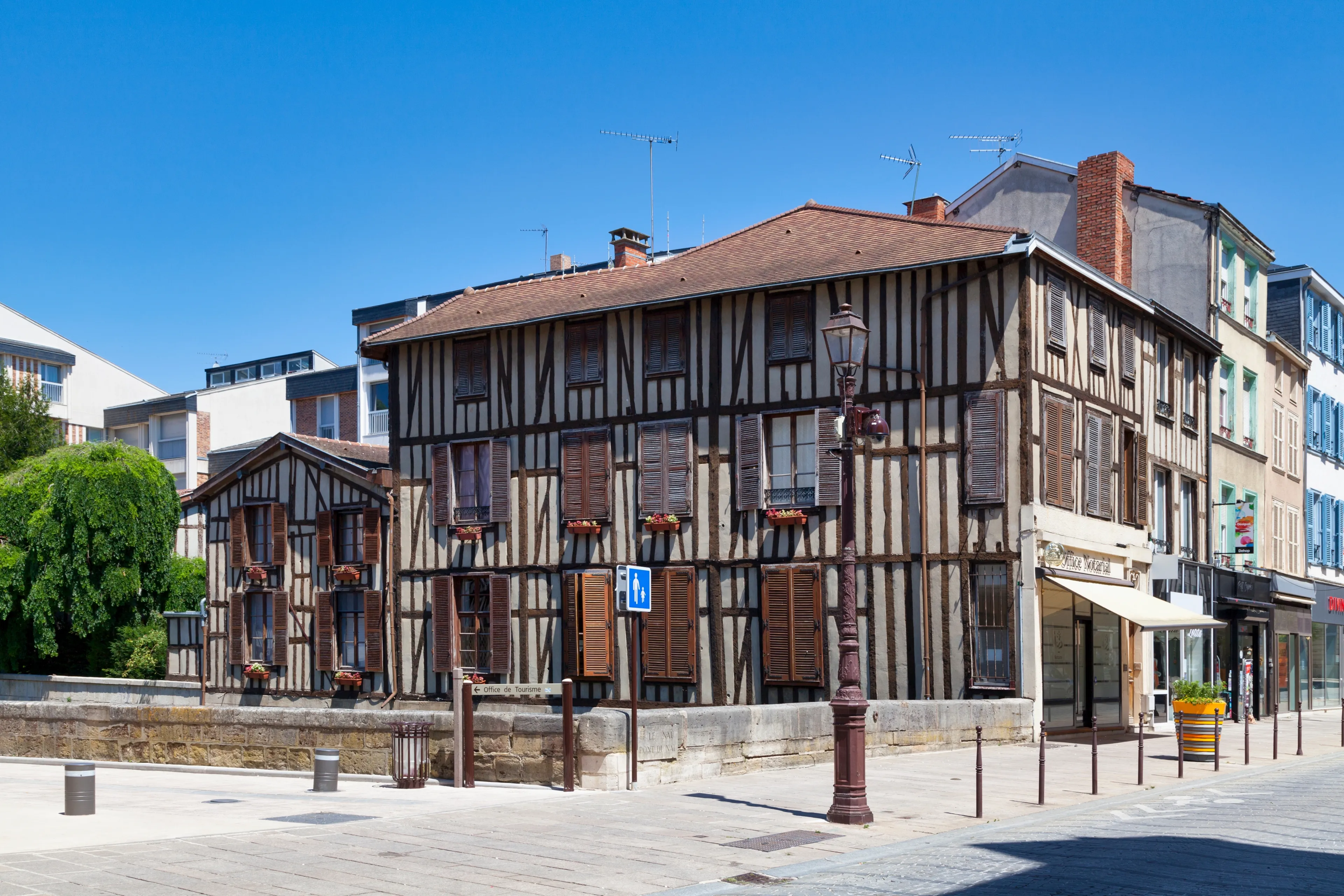 Châlons-en-Champagne, France - June 25 2020: Half-timbered house along the Nau river in the city center.