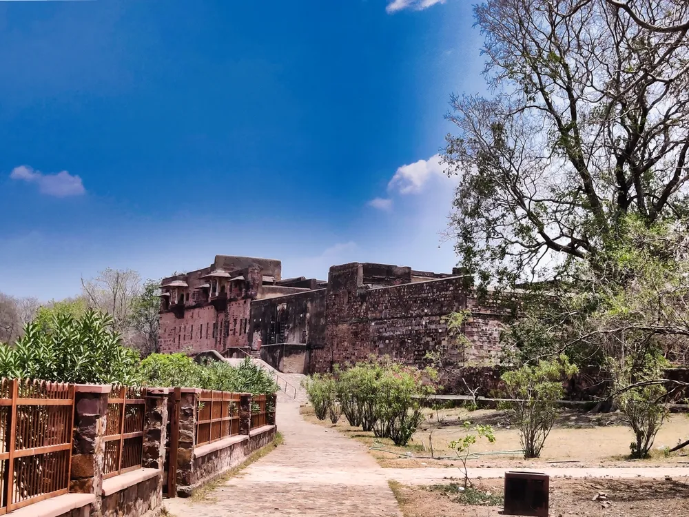 Sawai Madhopur, India 8 June 2024: Picture of Hamir Palace at Ranthambore Fort shot during daylight against blue sky 
